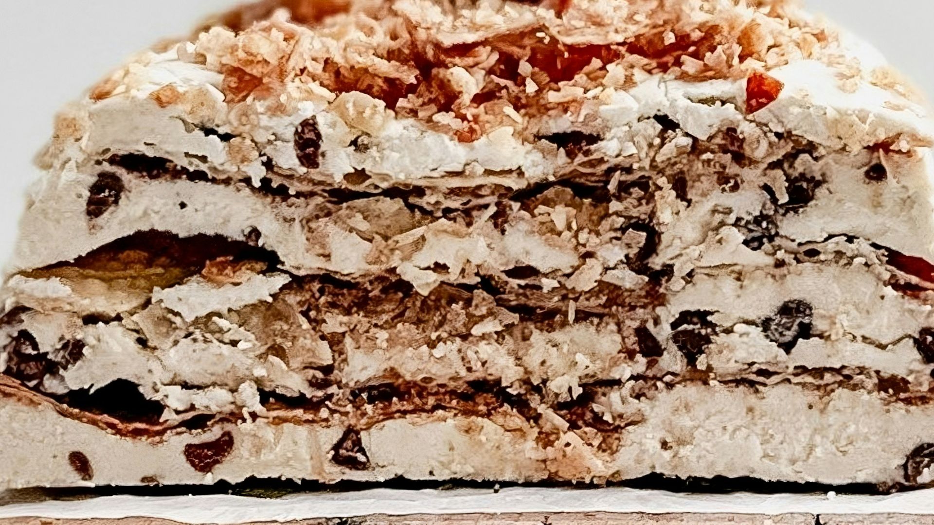 Layered ice cream cake with chocolate chips and crumbs
