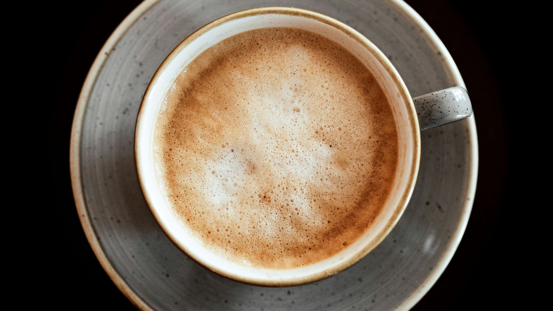 brown liquid in white ceramic mug