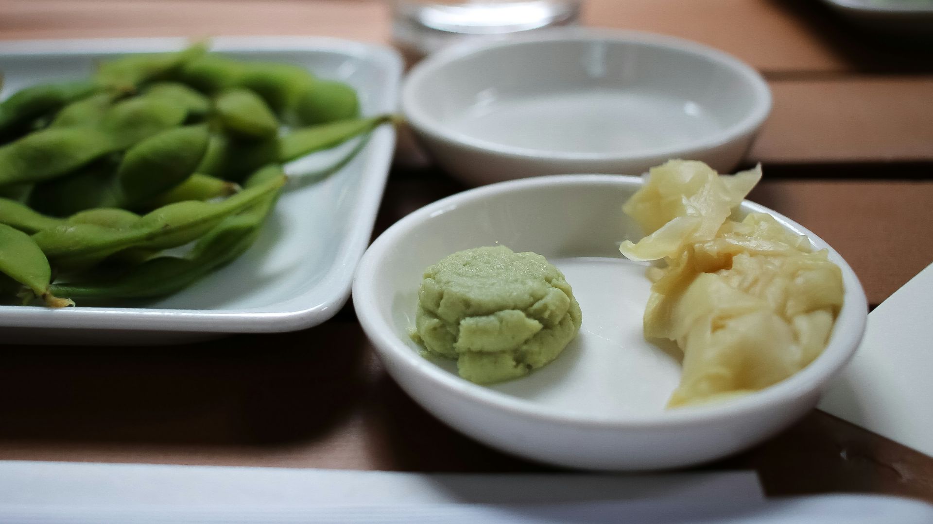 green vegetable on white ceramic bowl