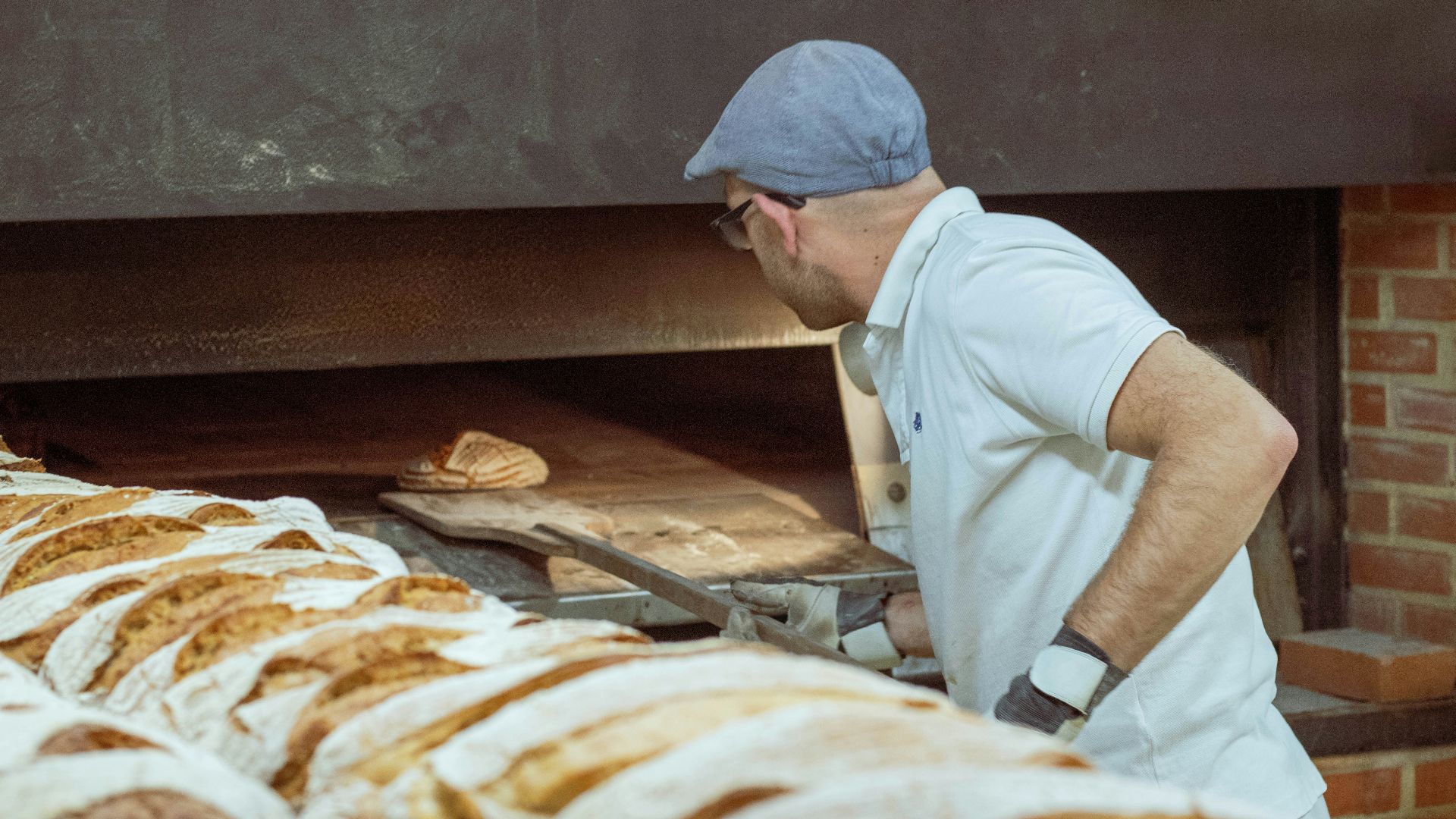 man wearing white polo shirt