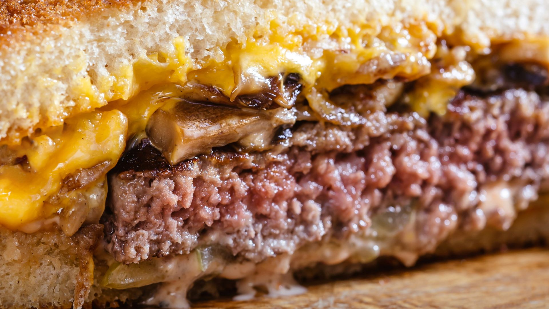 a sandwich with meat and cheese