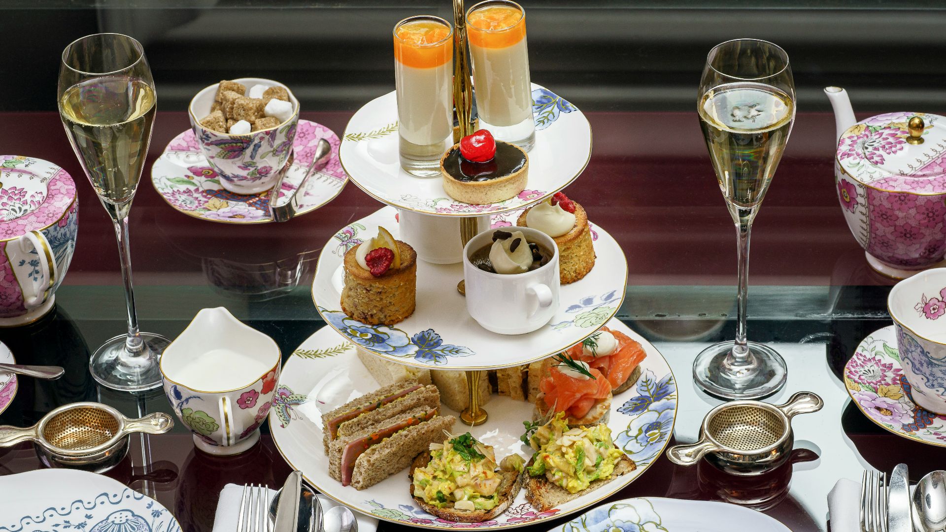 assorted pastries in rack between plates