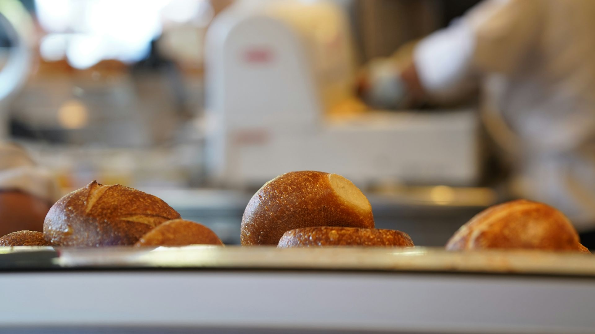 a bunch of croissants sitting on a counter