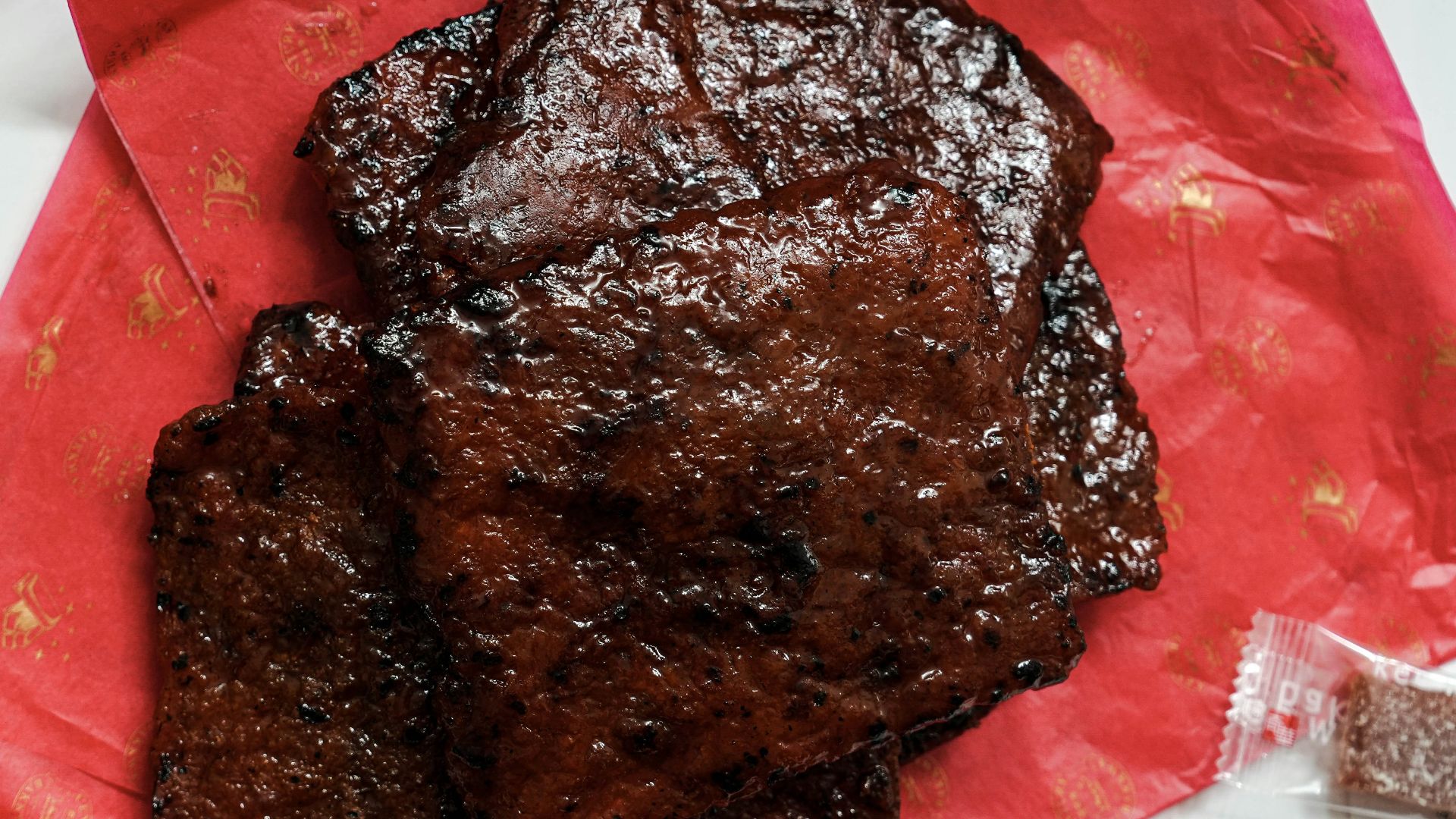 a plate of food and some oranges on a table