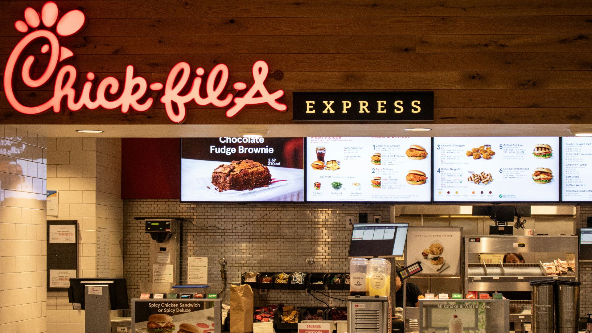 a fast food restaurant with a large menu