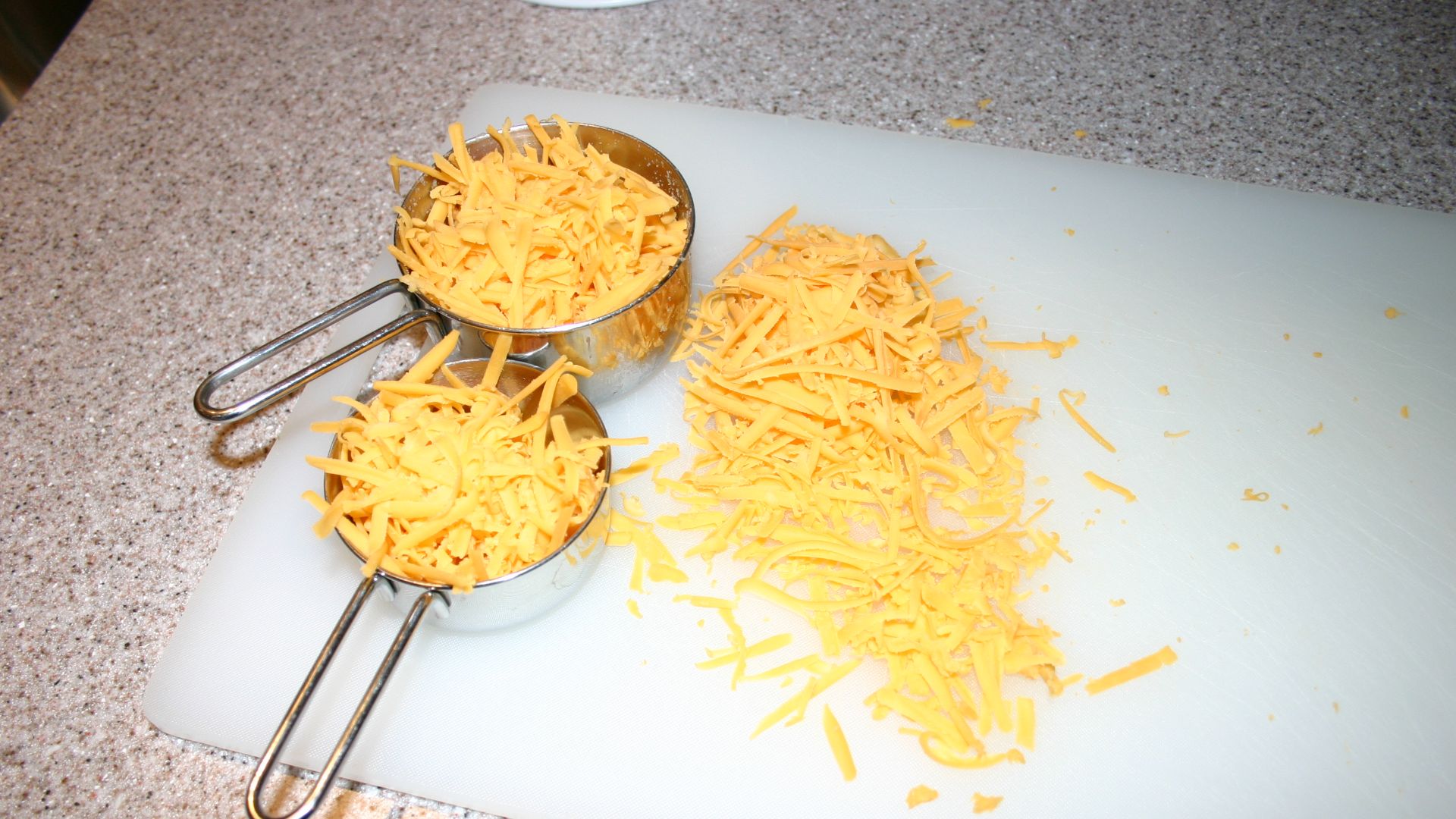 File:Grated cheese (331496238).jpg