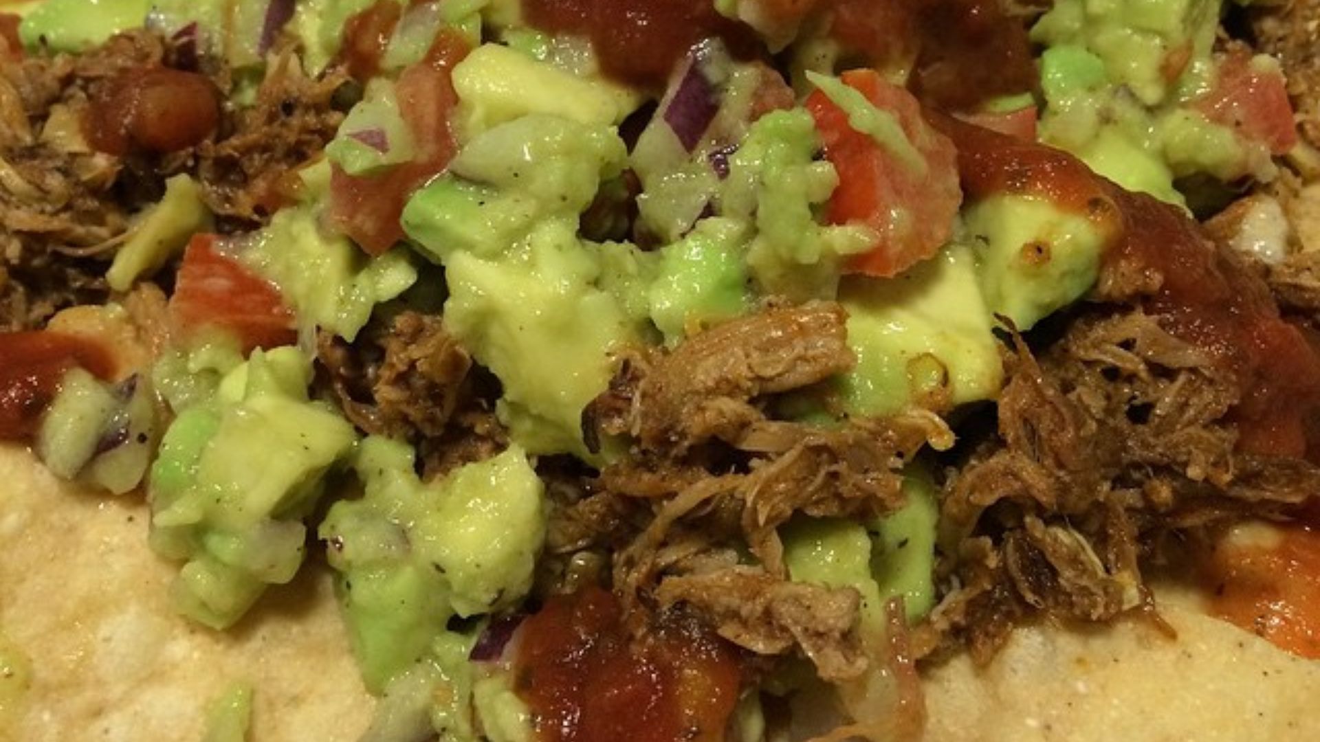 File:Pulled Pork Nachos featuring @ssgastrogrub pulled pork and homemade guacamole. (16227342695).jpg
