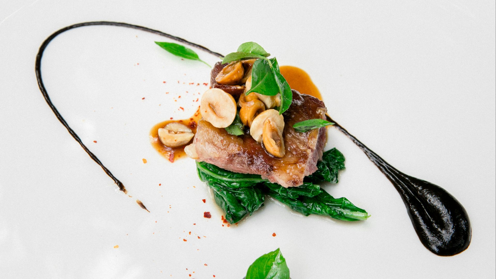 stainless steel fork on white ceramic plate