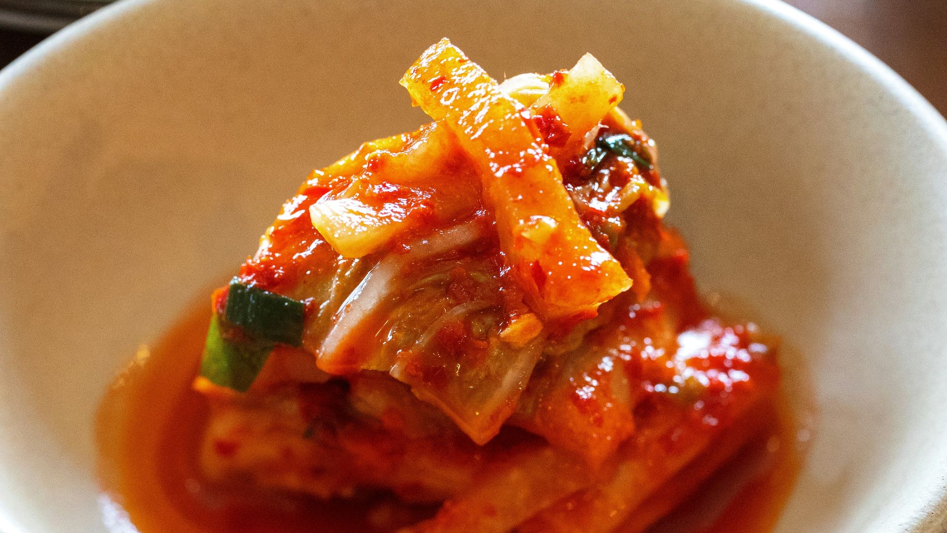 a close up of a bowl of food on a table