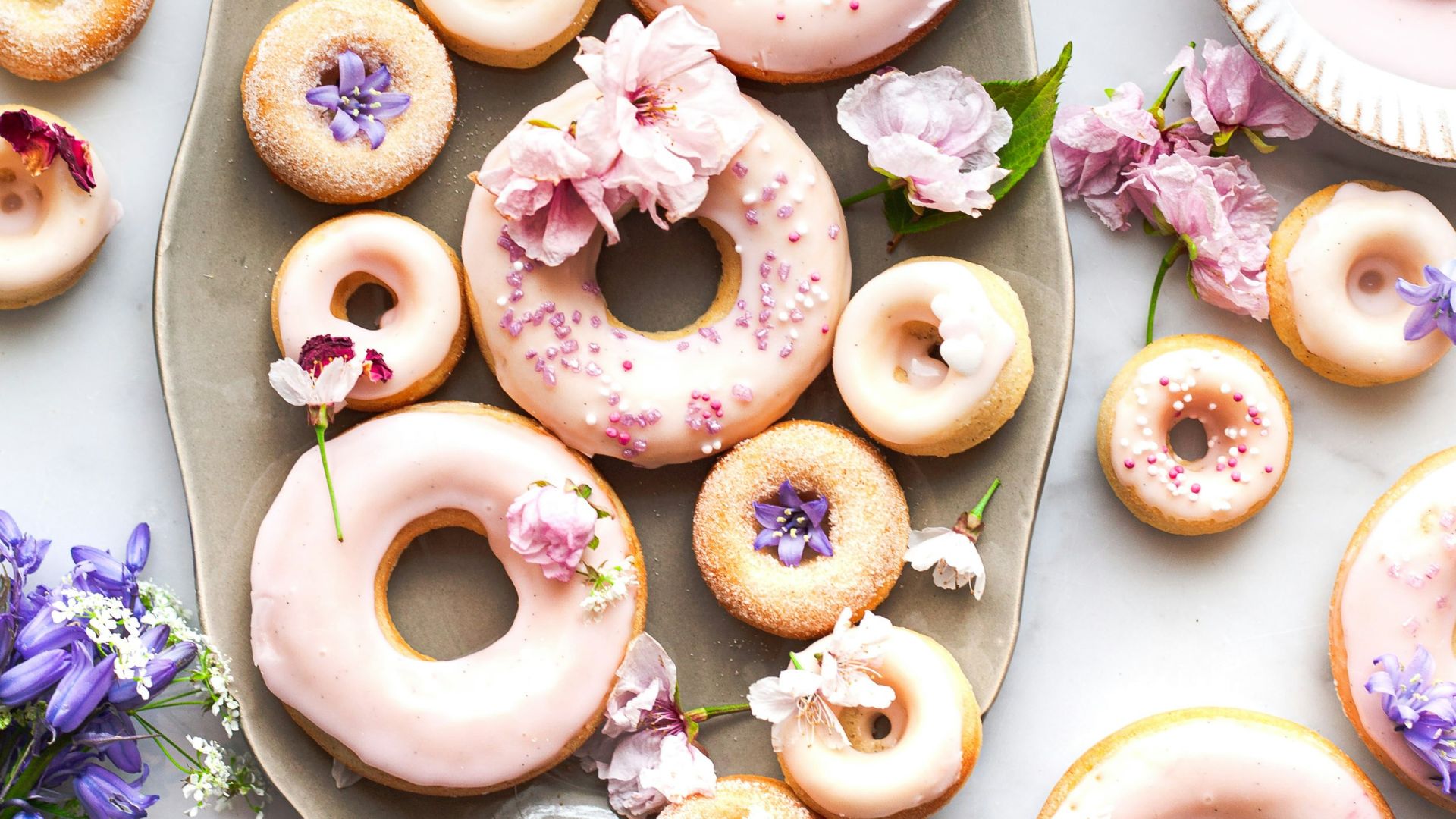 brown donut with white icing on top