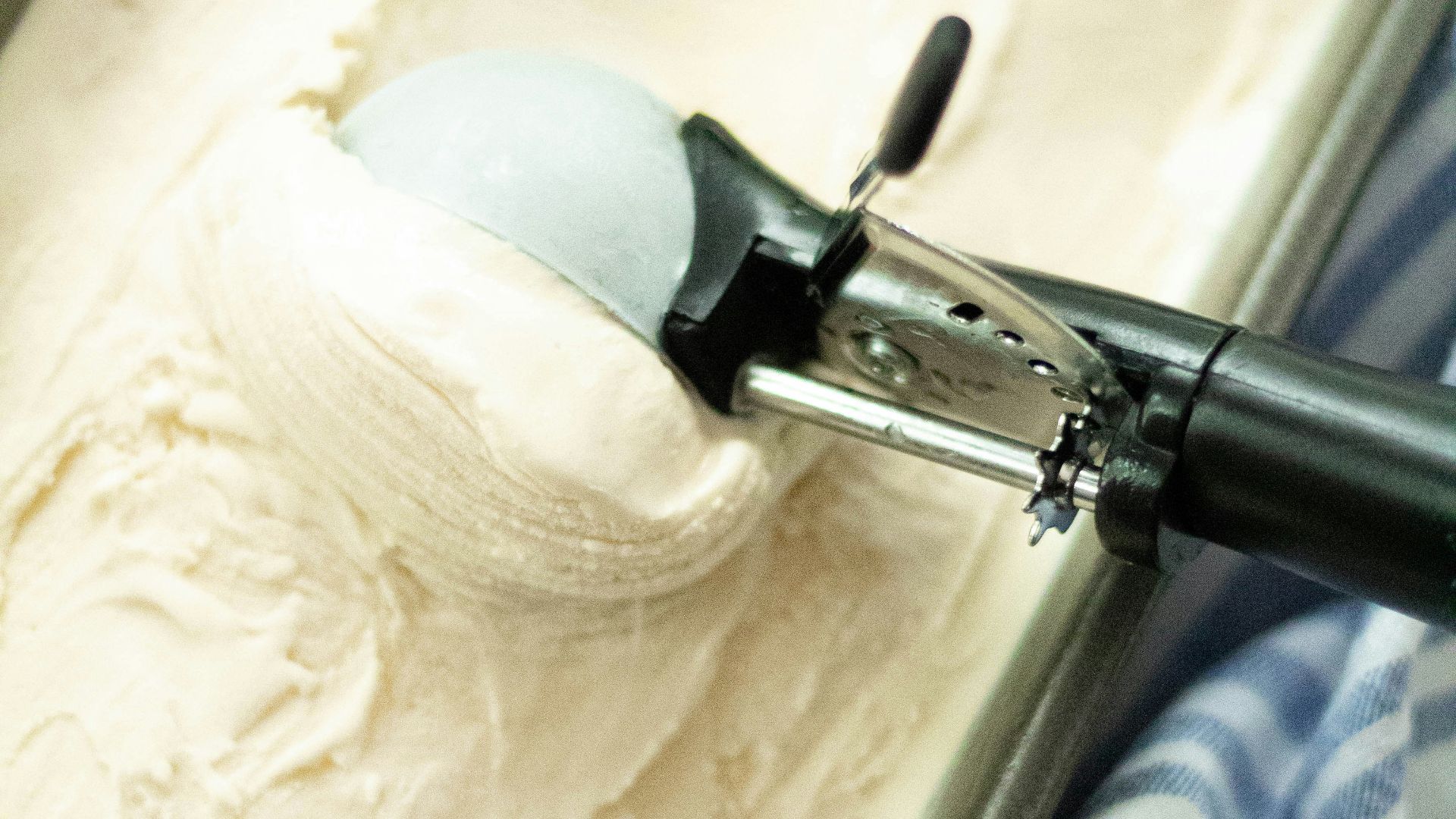 white and gray textile on white ceramic sink