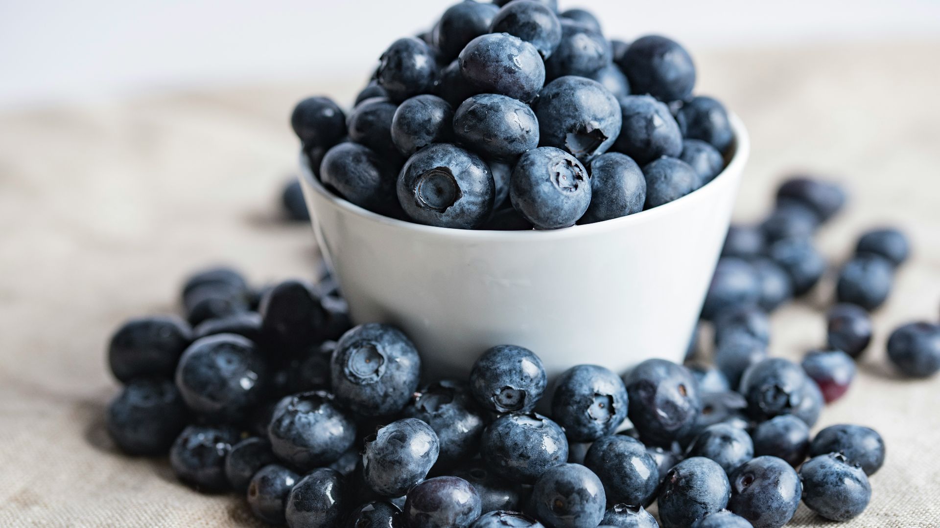 blueberries on white ceramic container