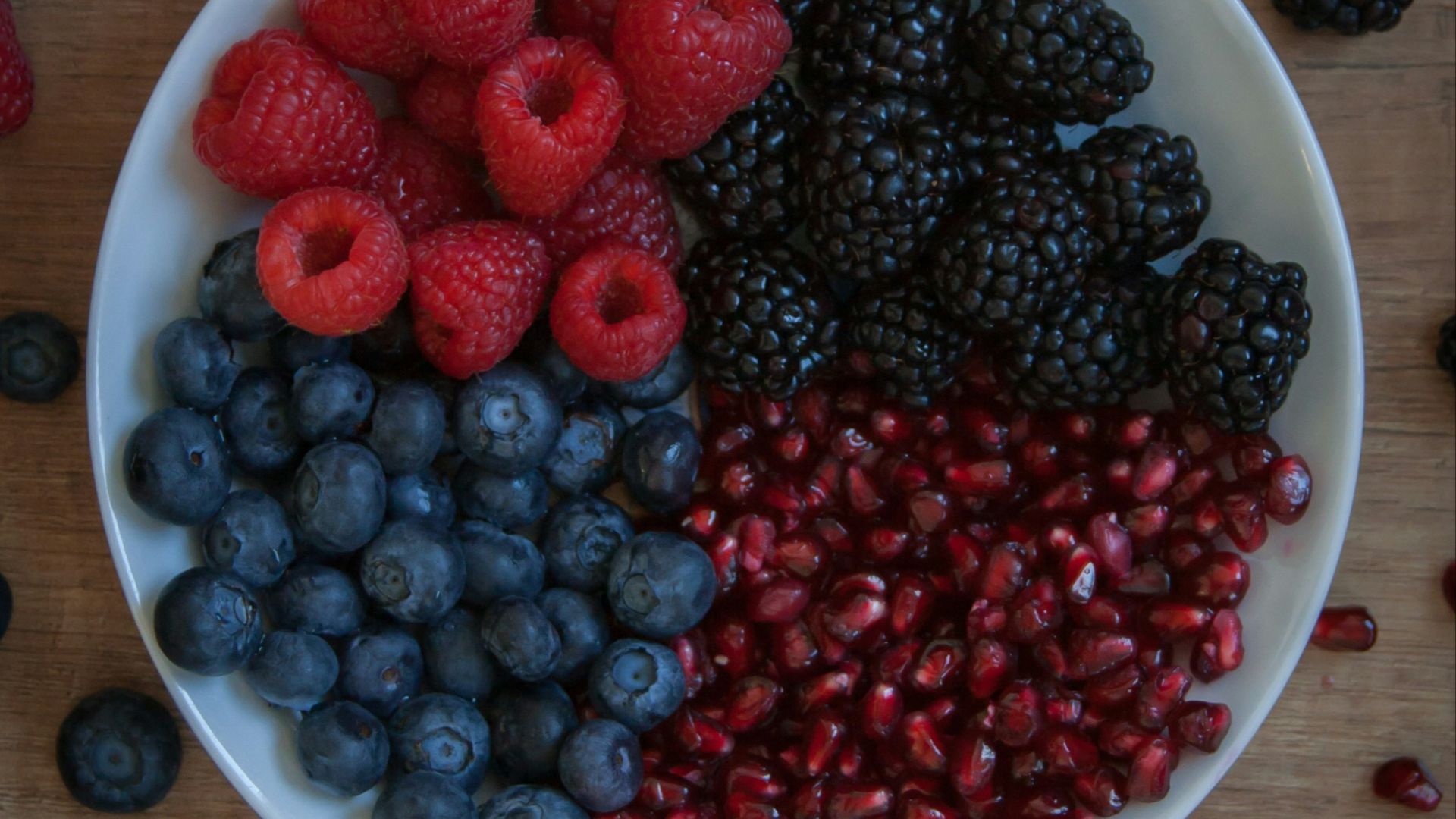 strawberries on white ceramic bowl