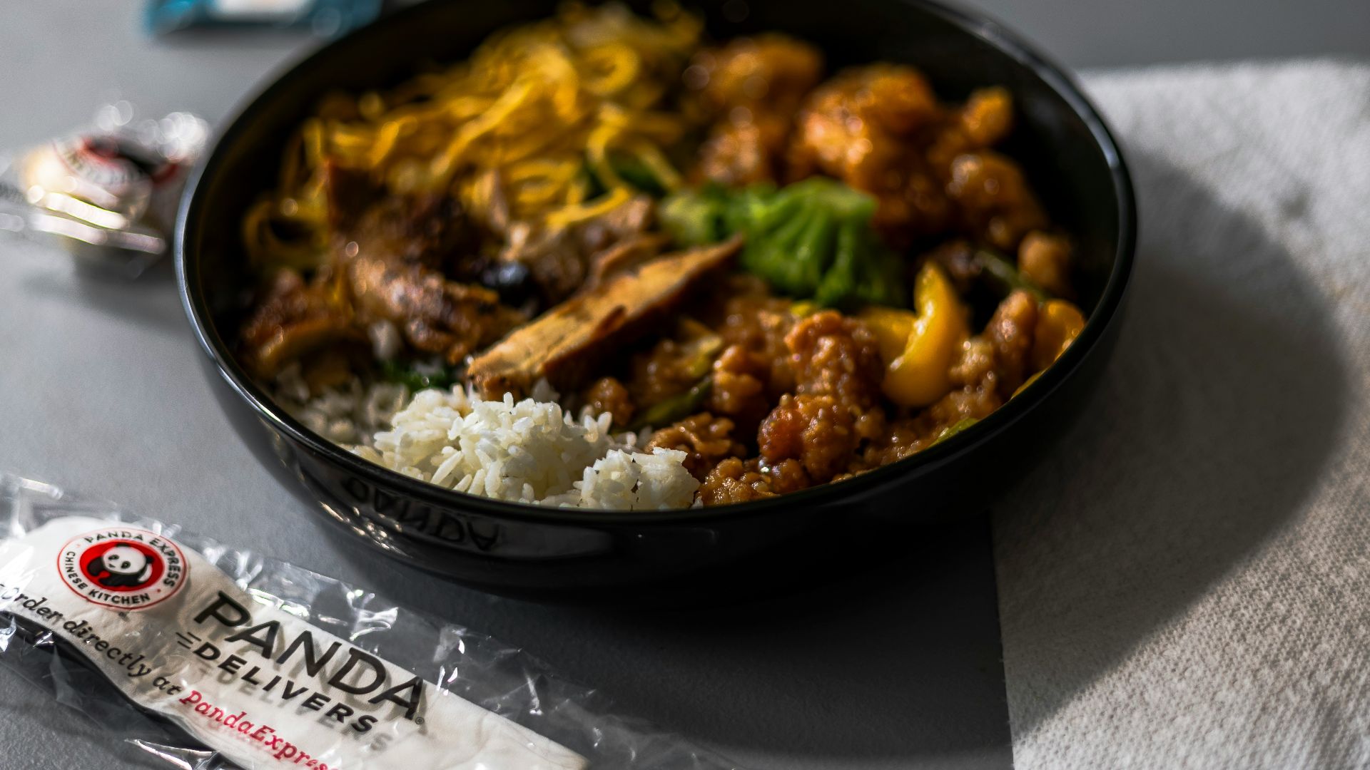 A bowl of food sitting on top of a table