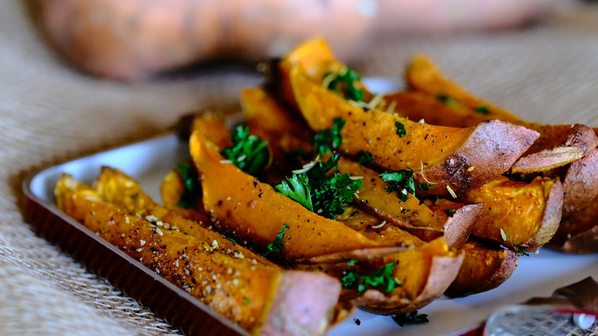 sliced vegetable on brown wooden chopping board