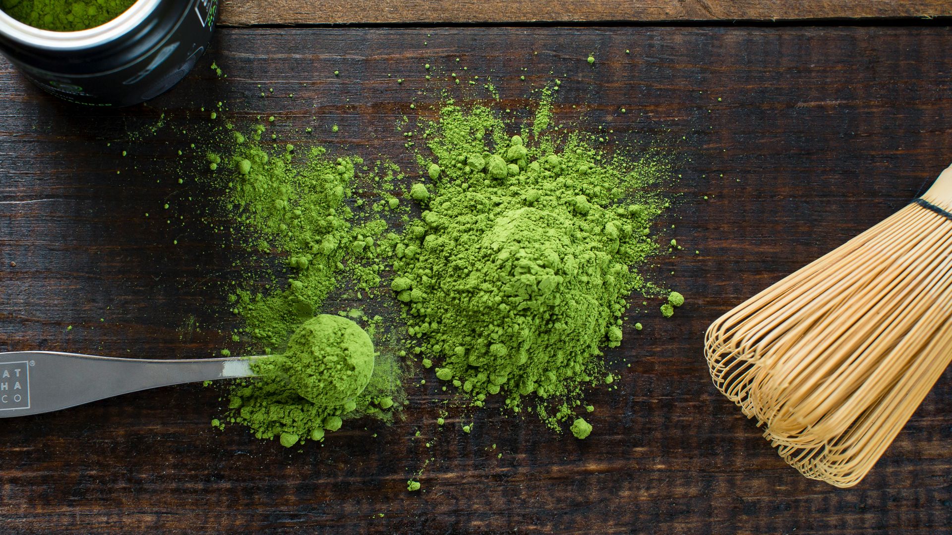 green powder and spoon on board