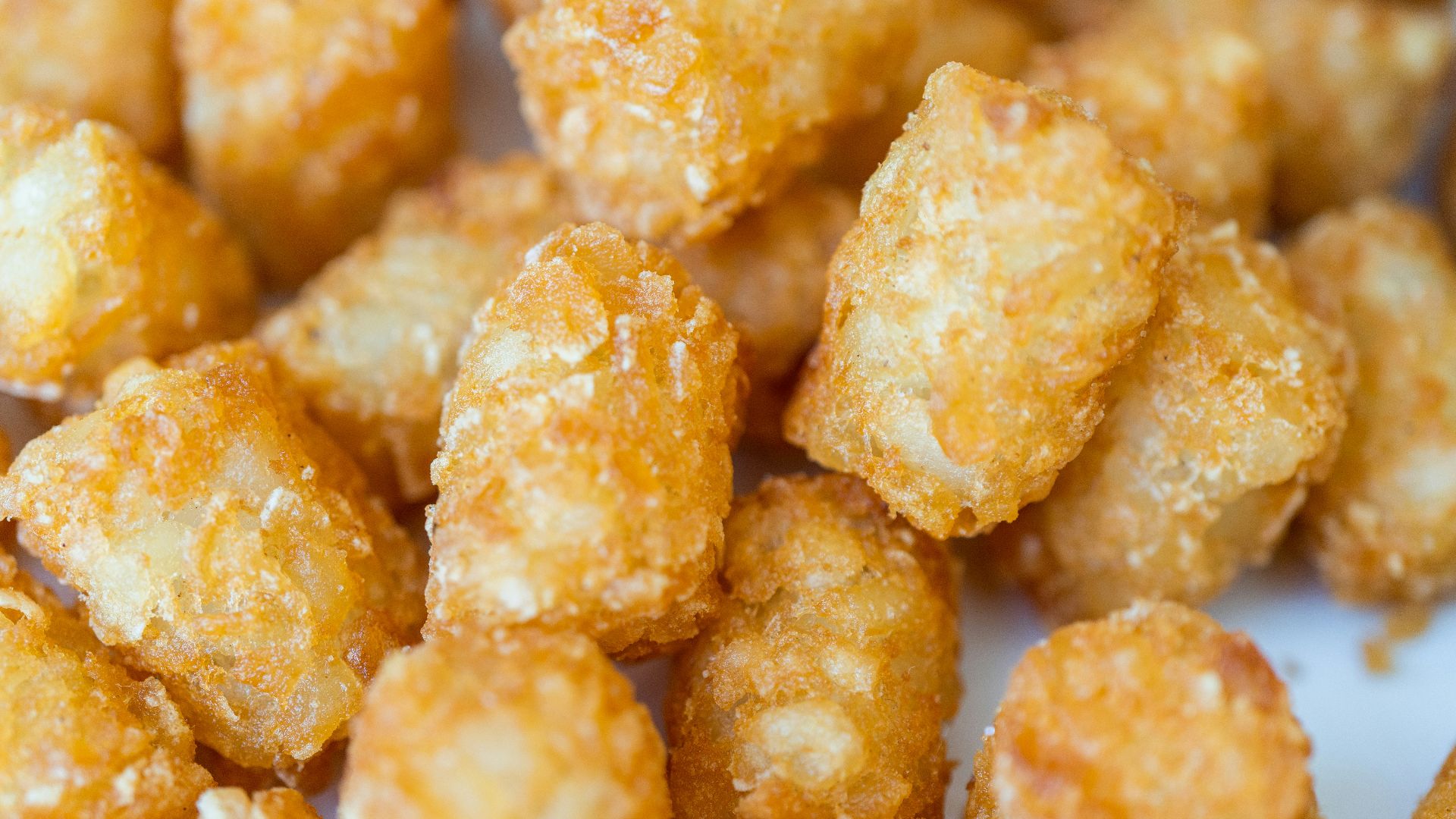 brown food in white ceramic plate