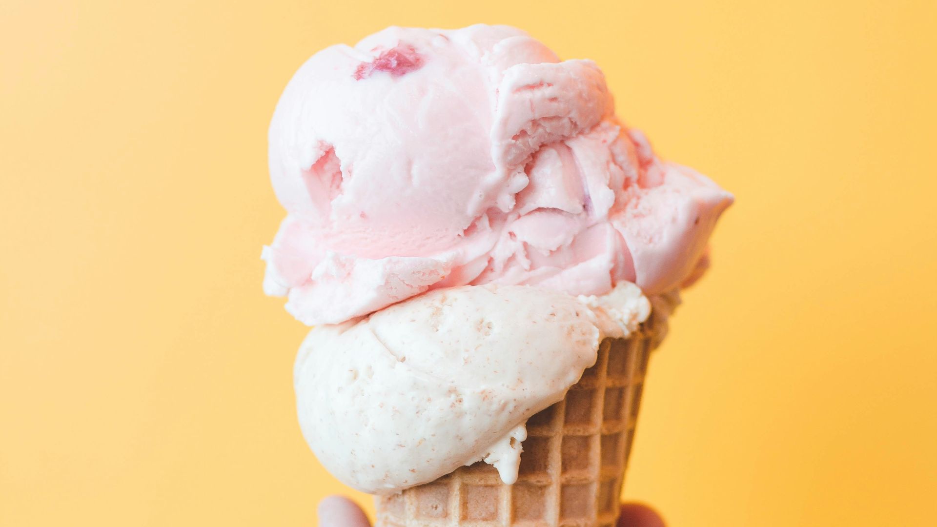 strawberry ice cream on cone