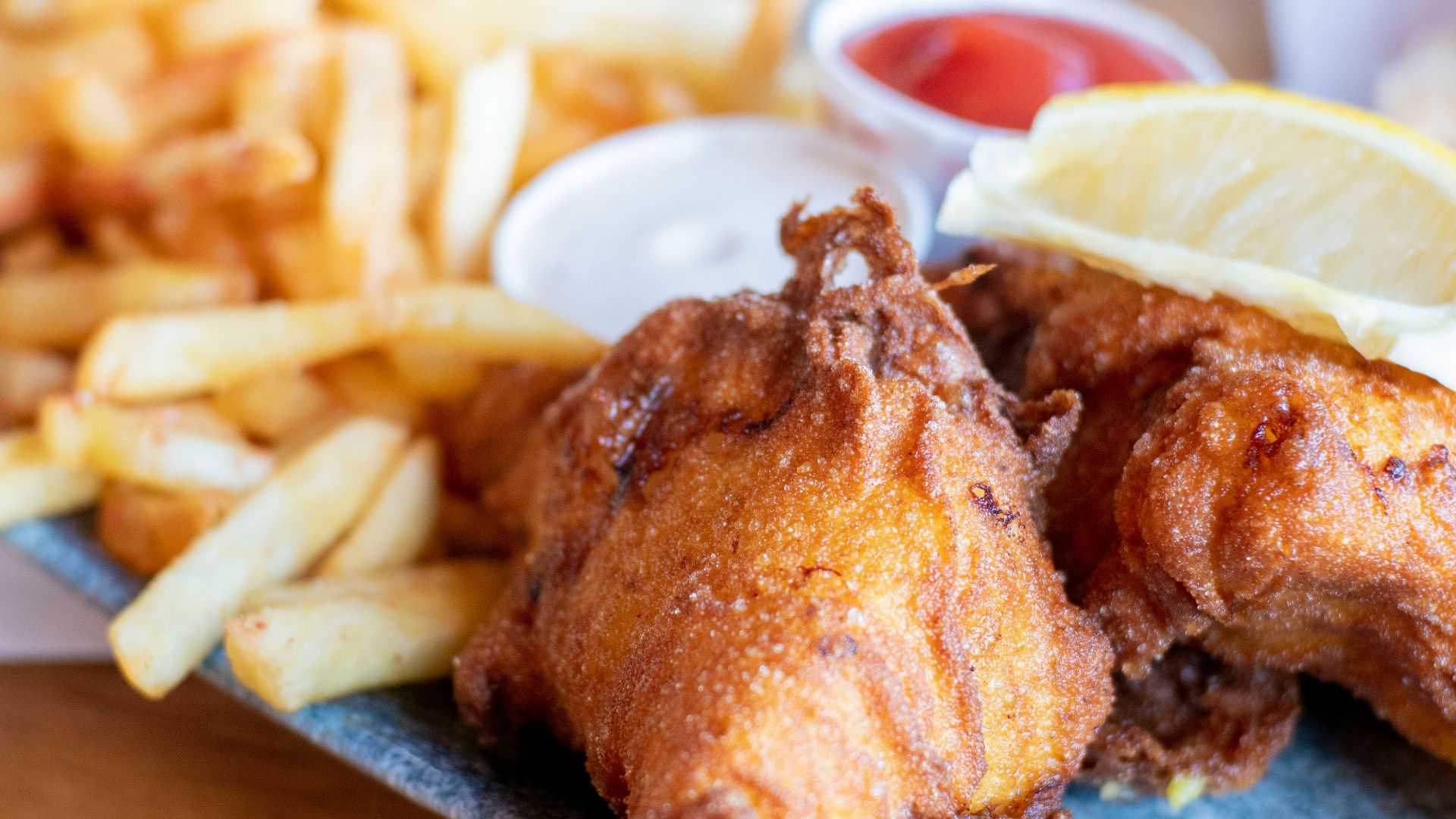 fried chicken with fries and sauce