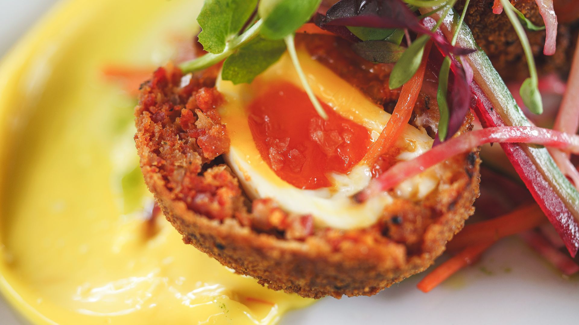 a close up of a plate of food on a table