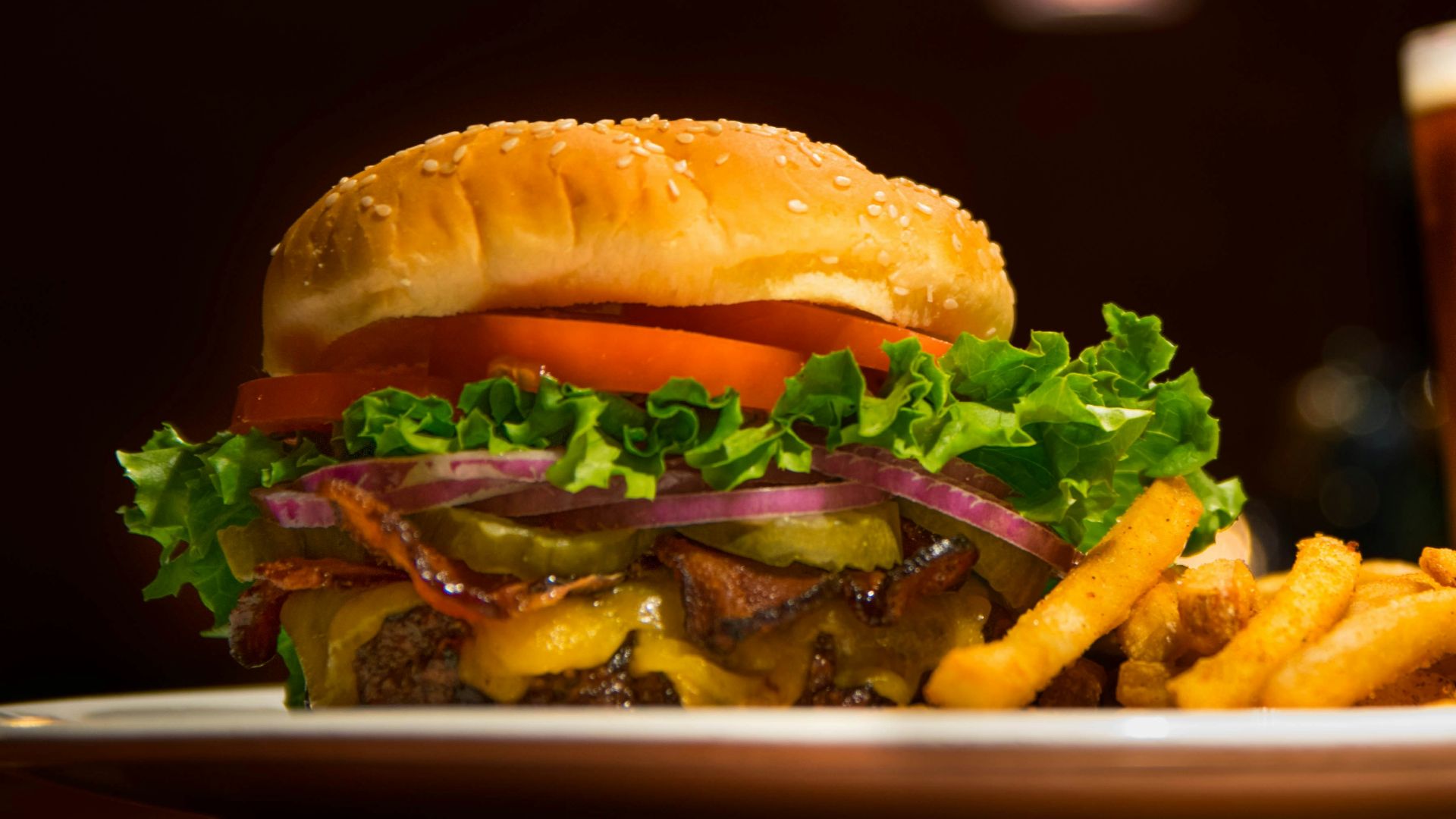 burger and fries on plate