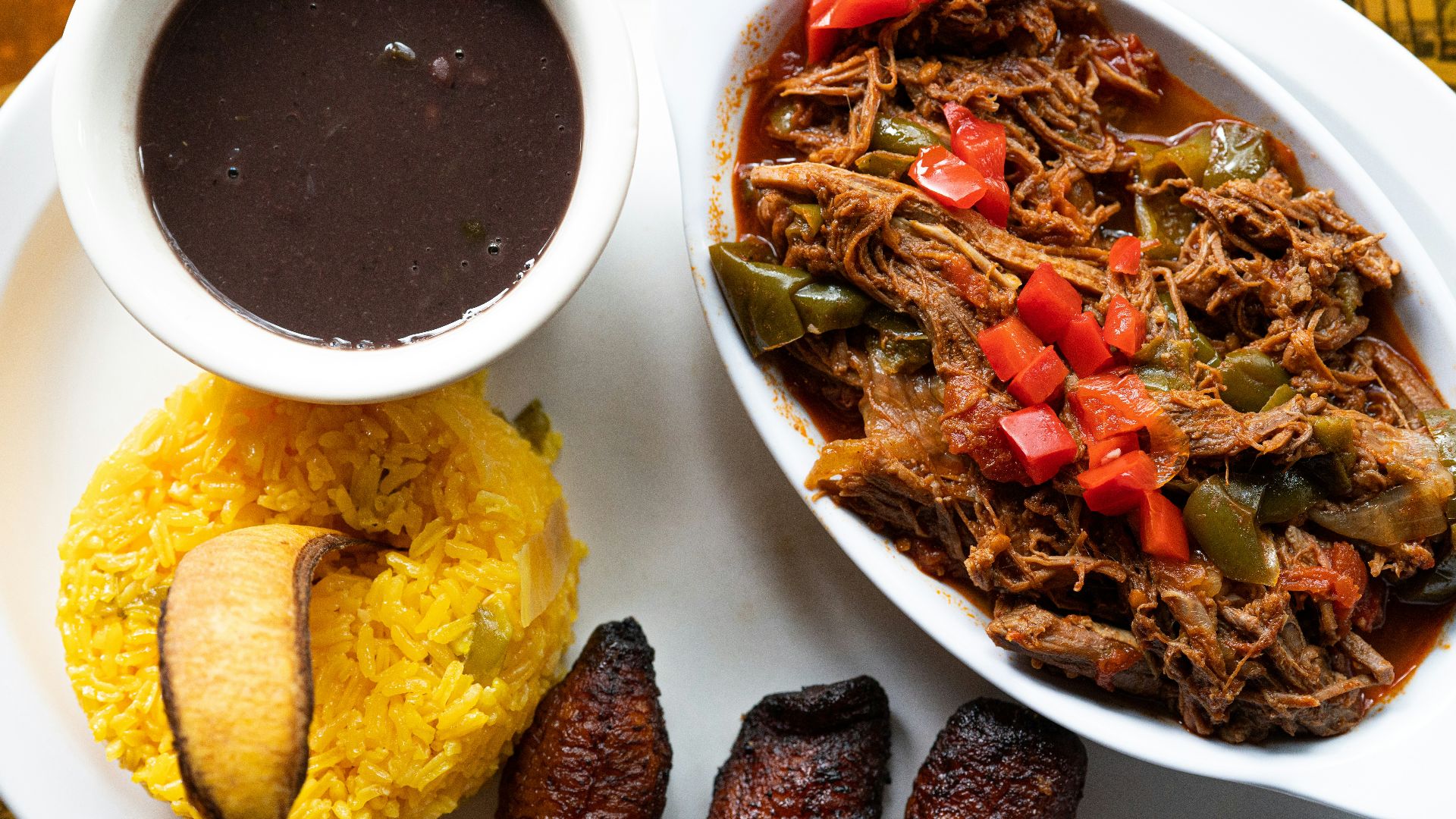 A plate of delicious caribbean food.