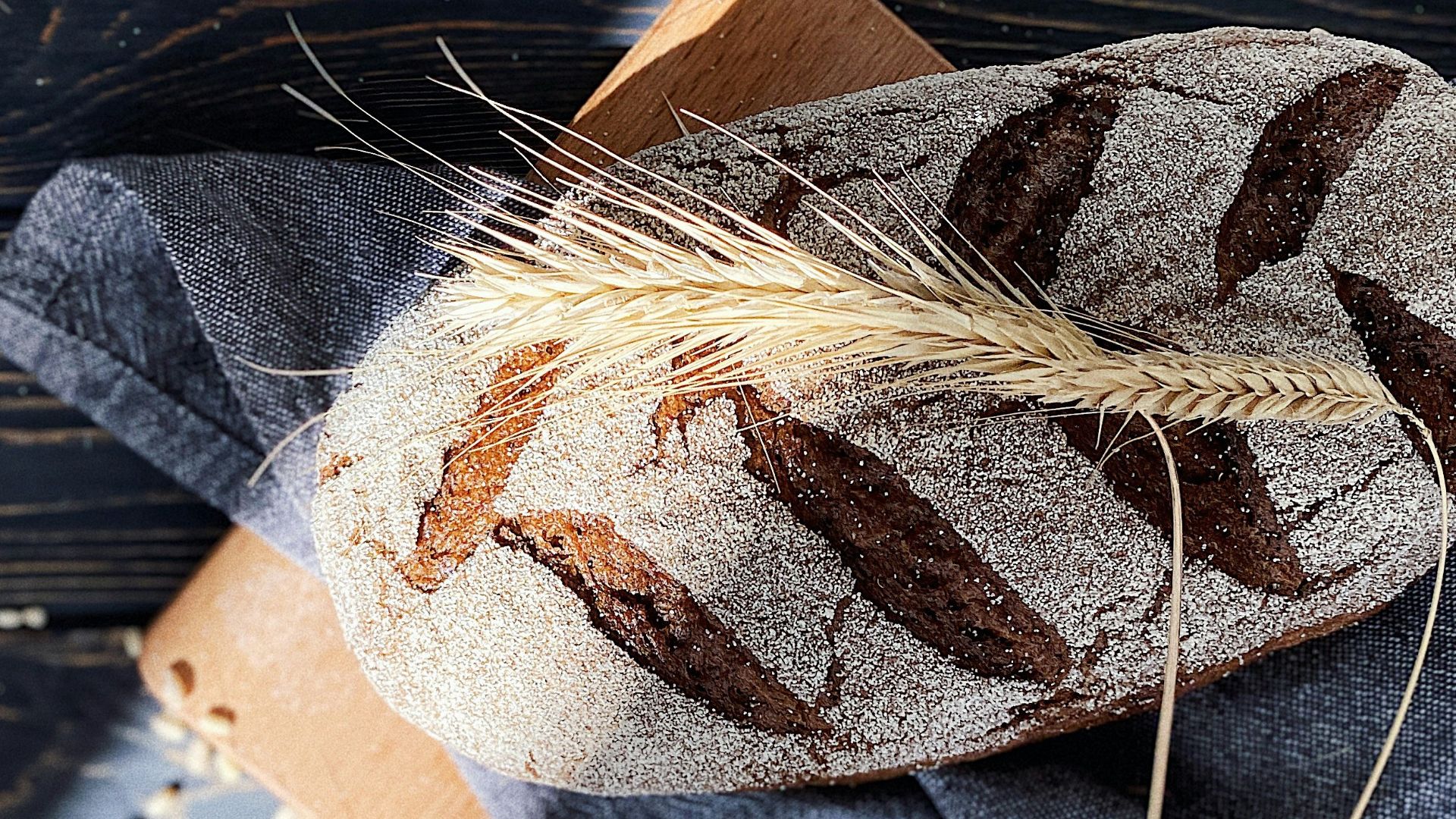 brown and white leaf on blue denim jeans