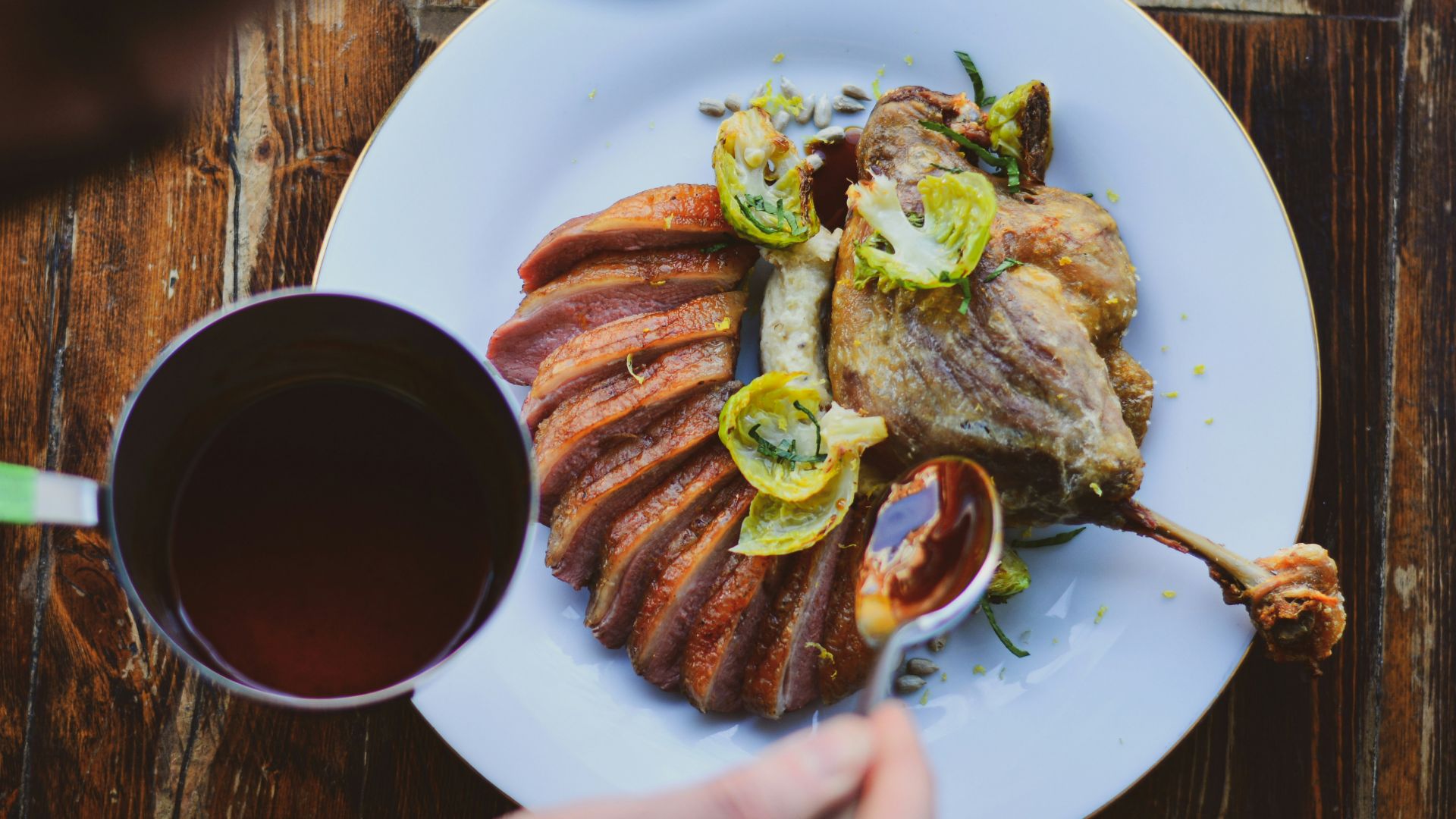 a plate of food and a cup of coffee