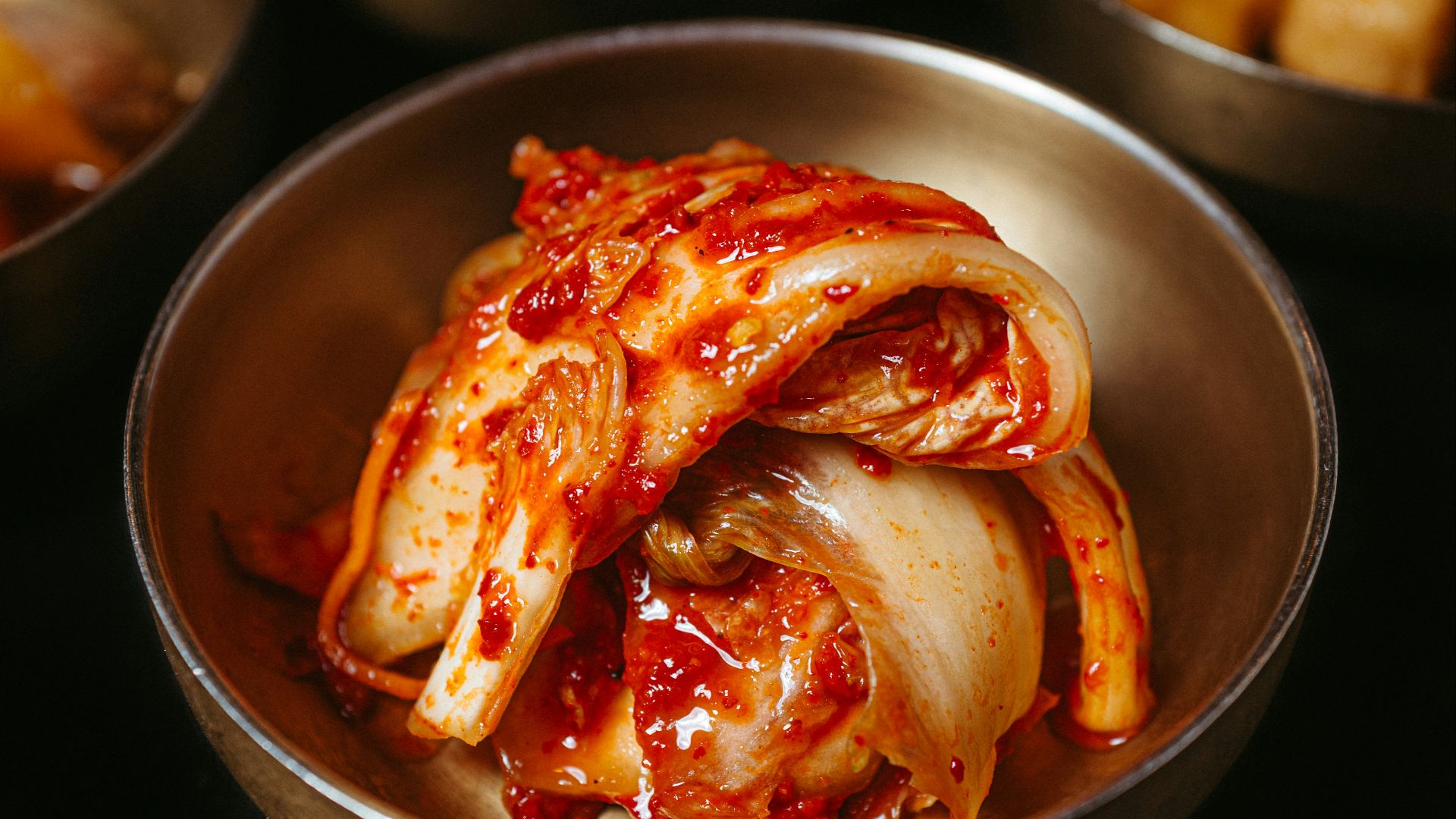a table topped with bowls filled with food