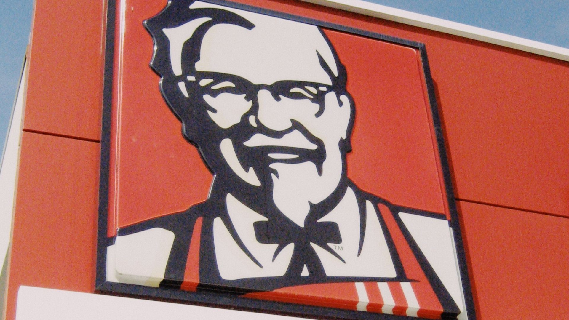 a picture of a man on the side of a building