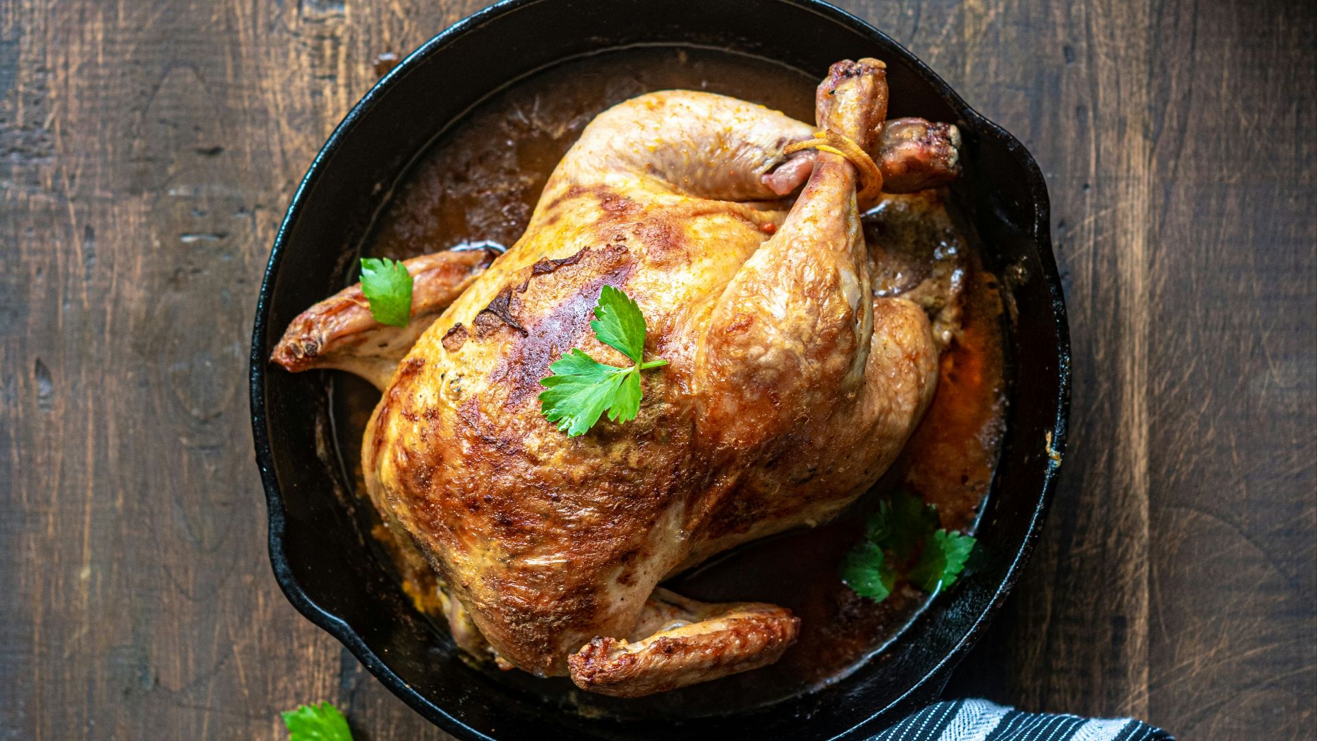 chicken on black round plate