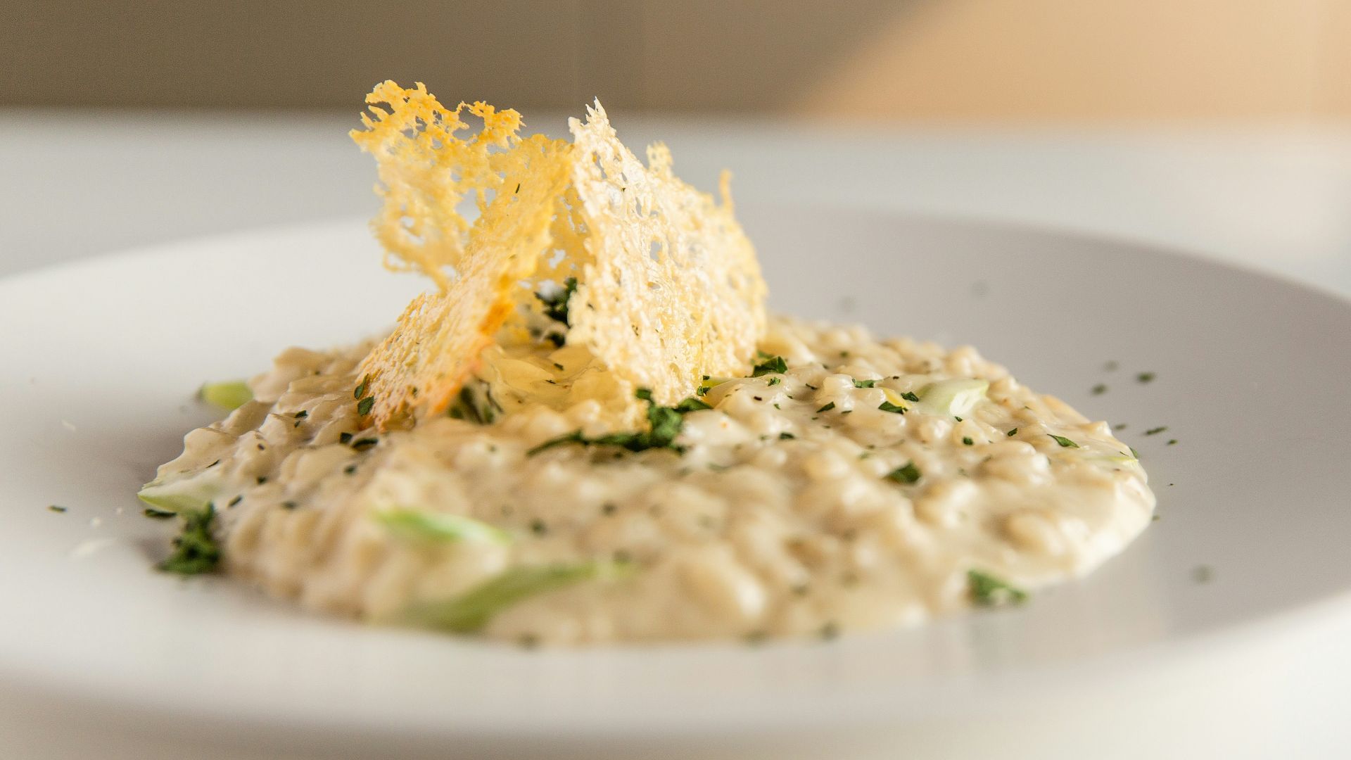 a white plate topped with food on top of a table