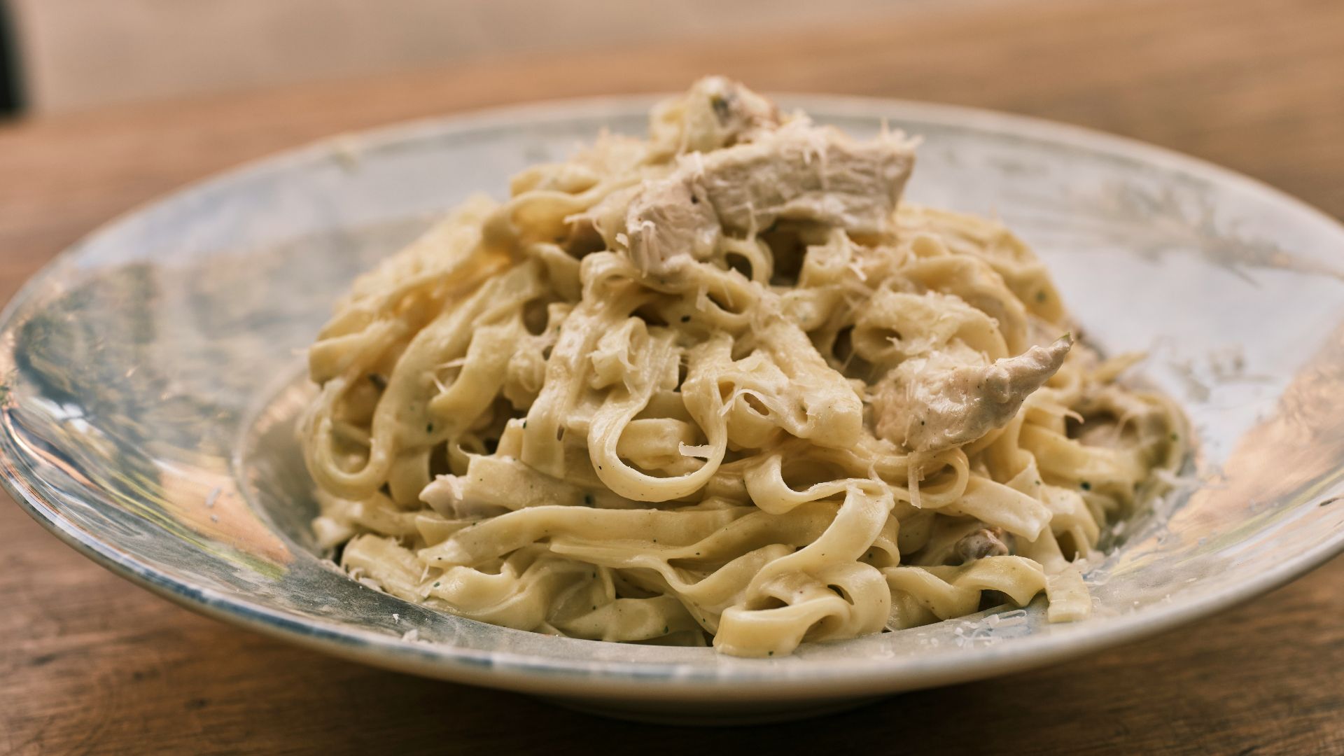 a plate of food on a wooden table