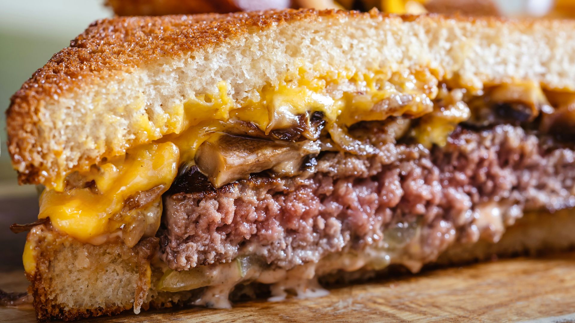 a sandwich with meat and cheese