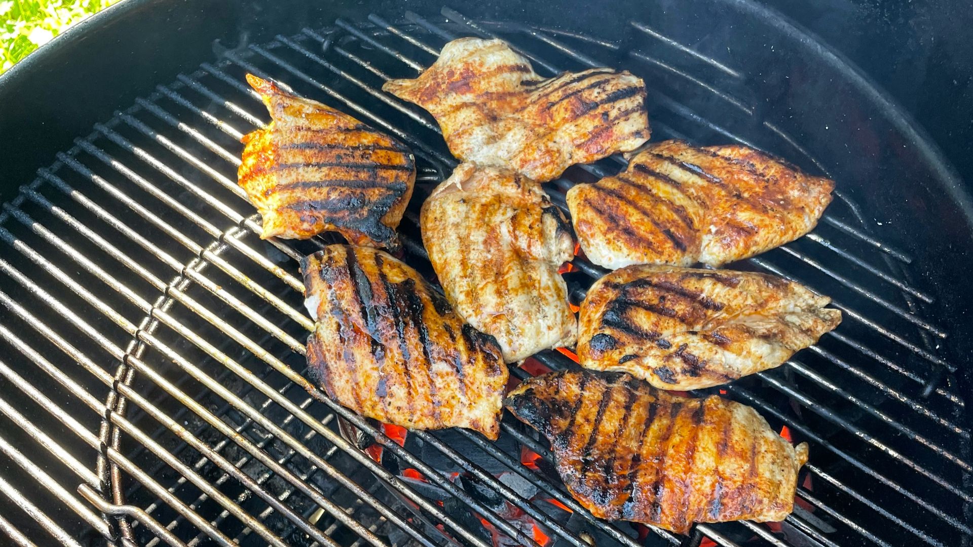 a grill with some meat on top of it