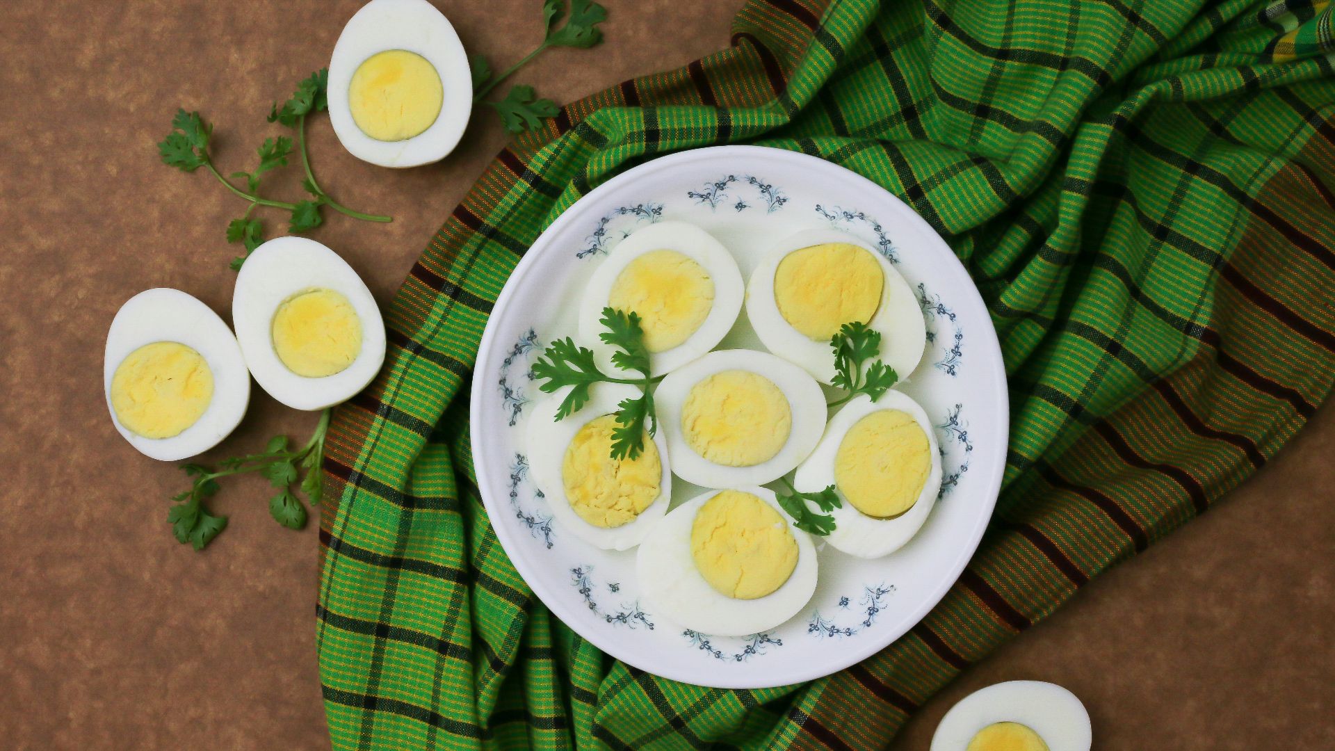 white and green floral round plate