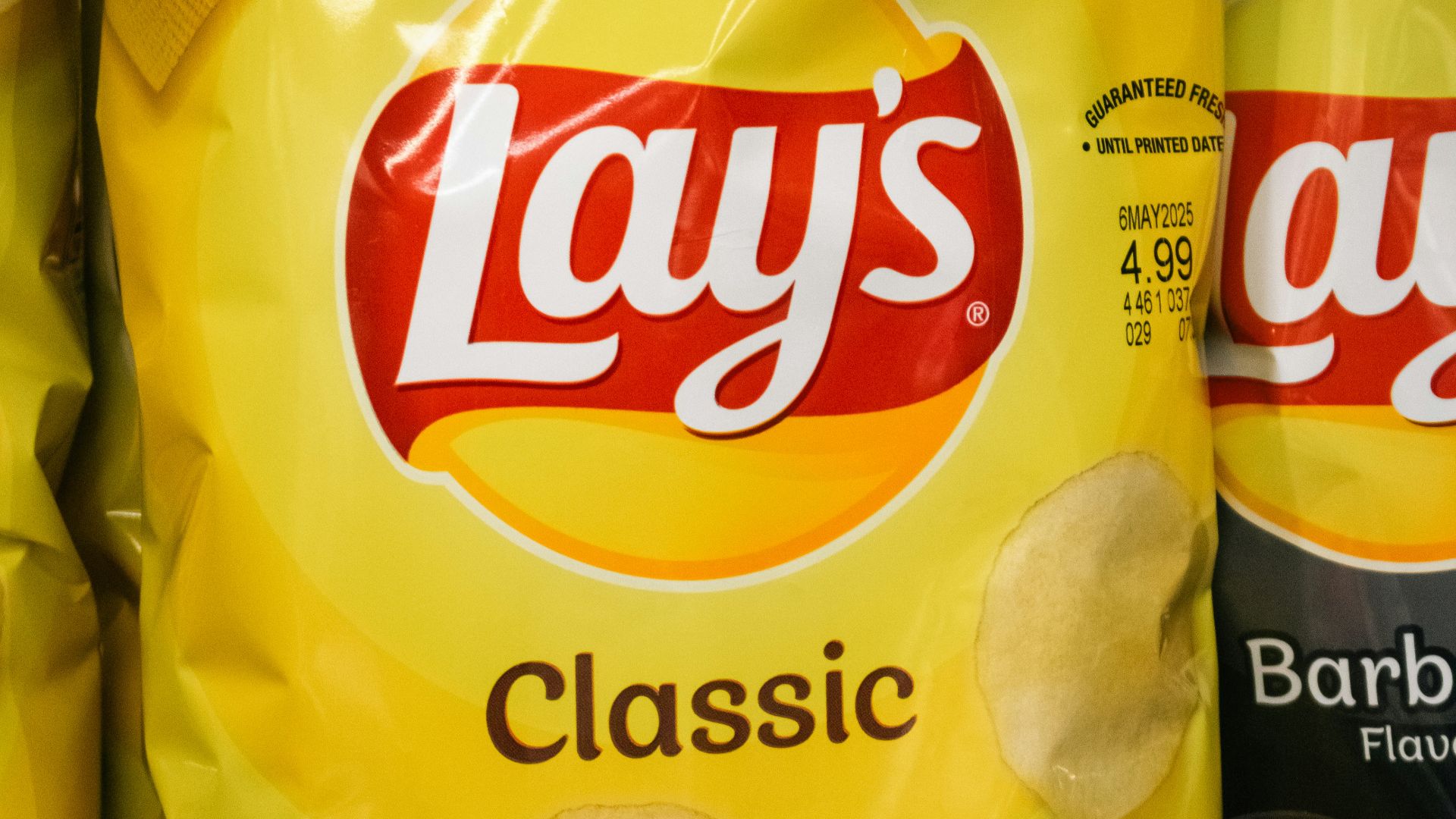 A bag of lay's classic potato chips.