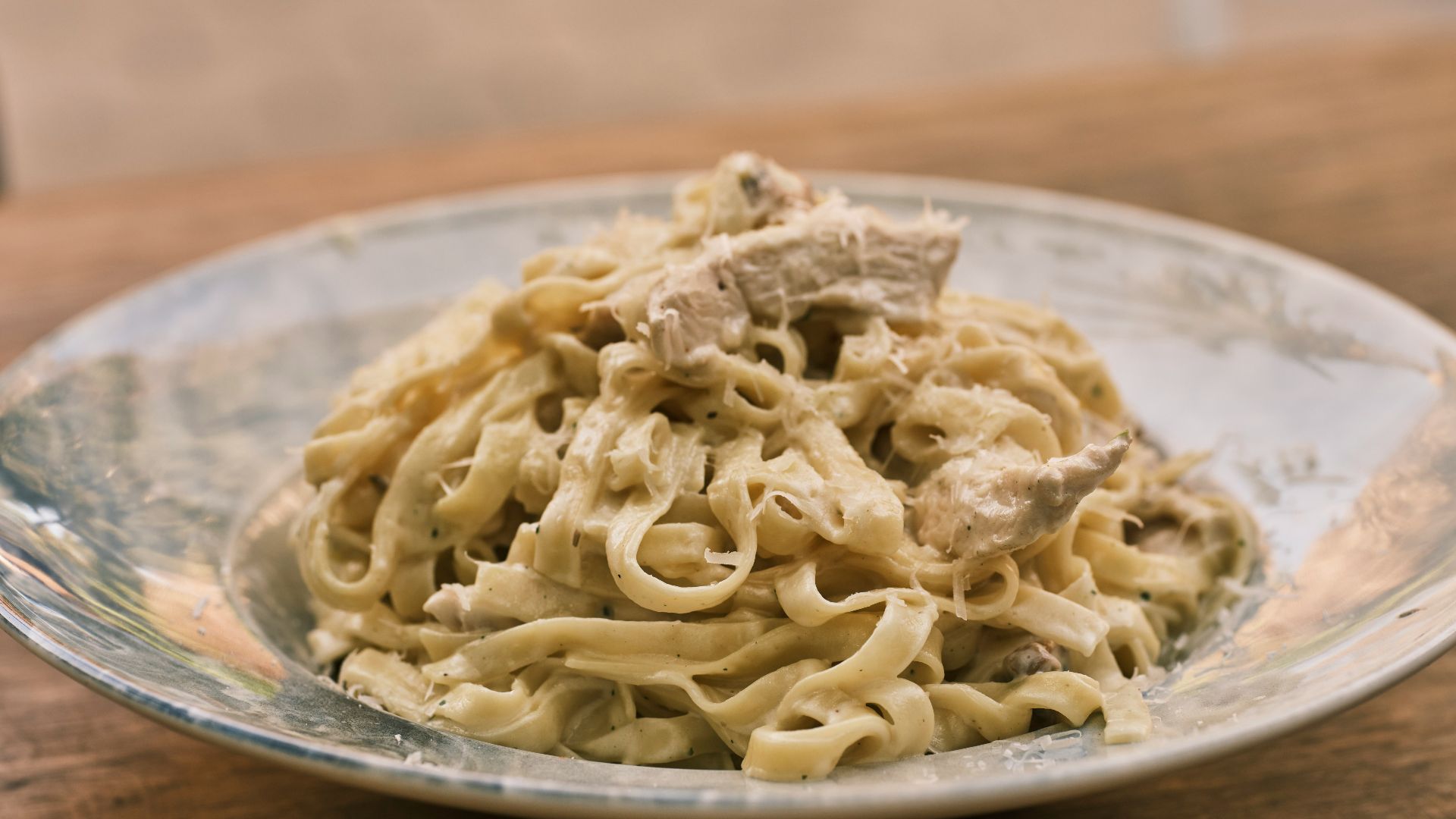 a plate of food on a wooden table
