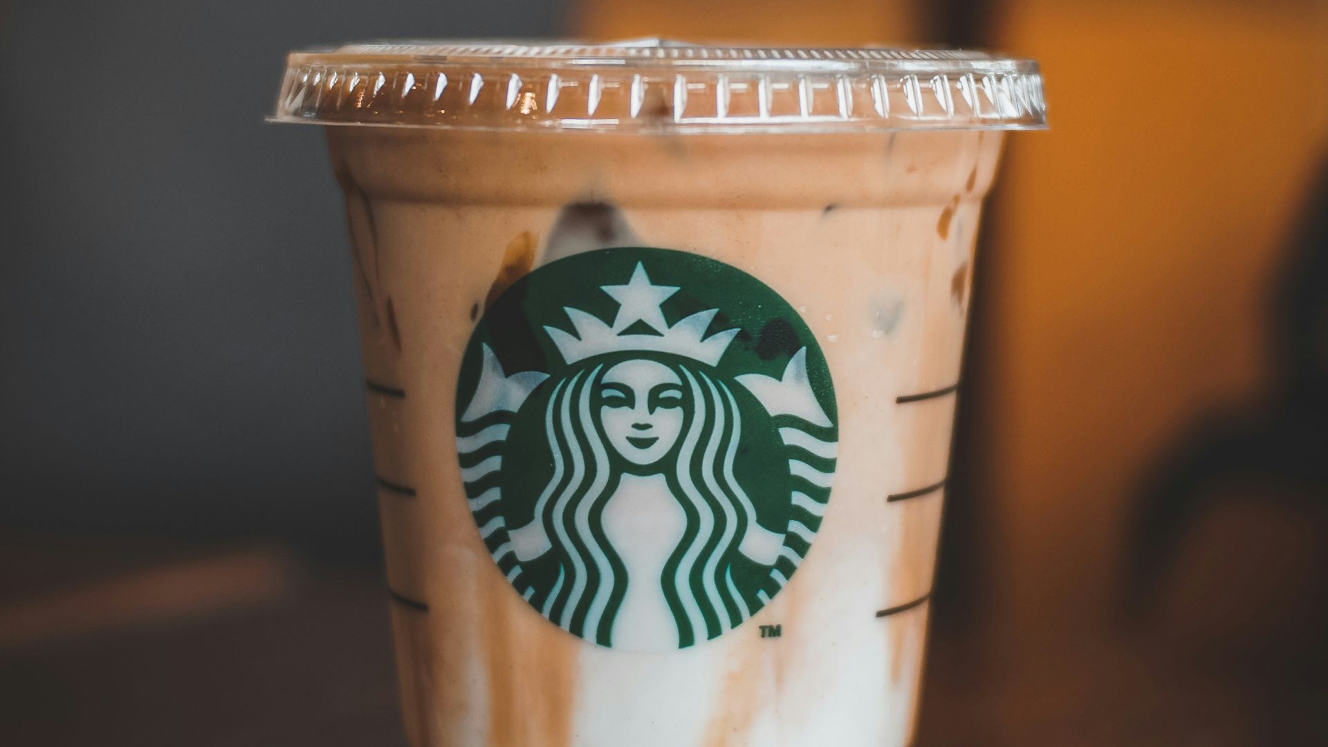 white and brown starbucks cup