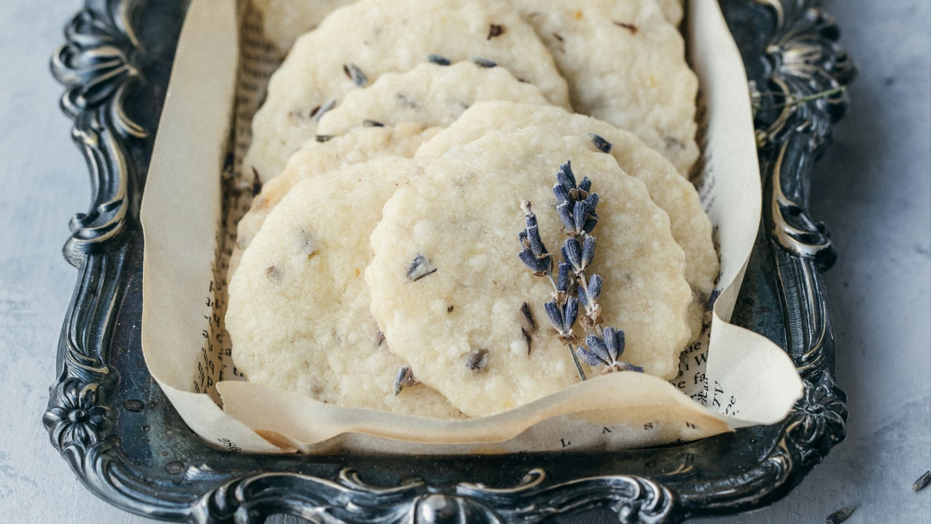 white cookies in black tray\