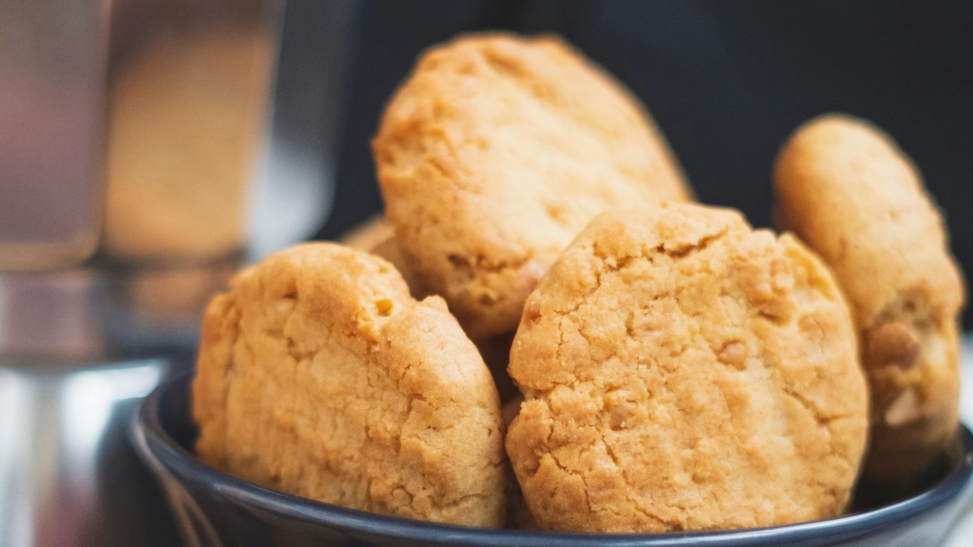 brown cookies in black ceramic bowl