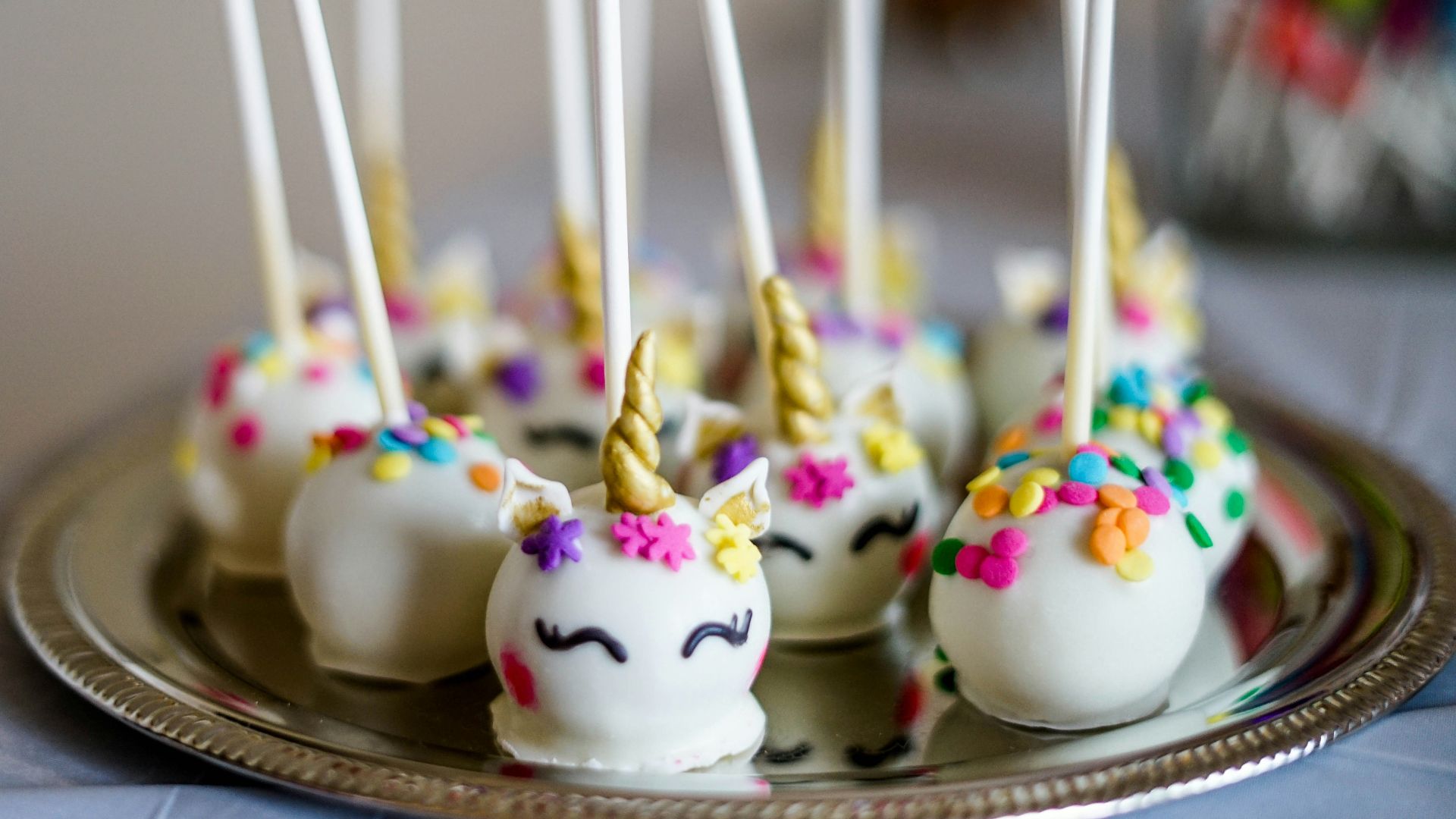 shallow focus photo of unicorn lollipops