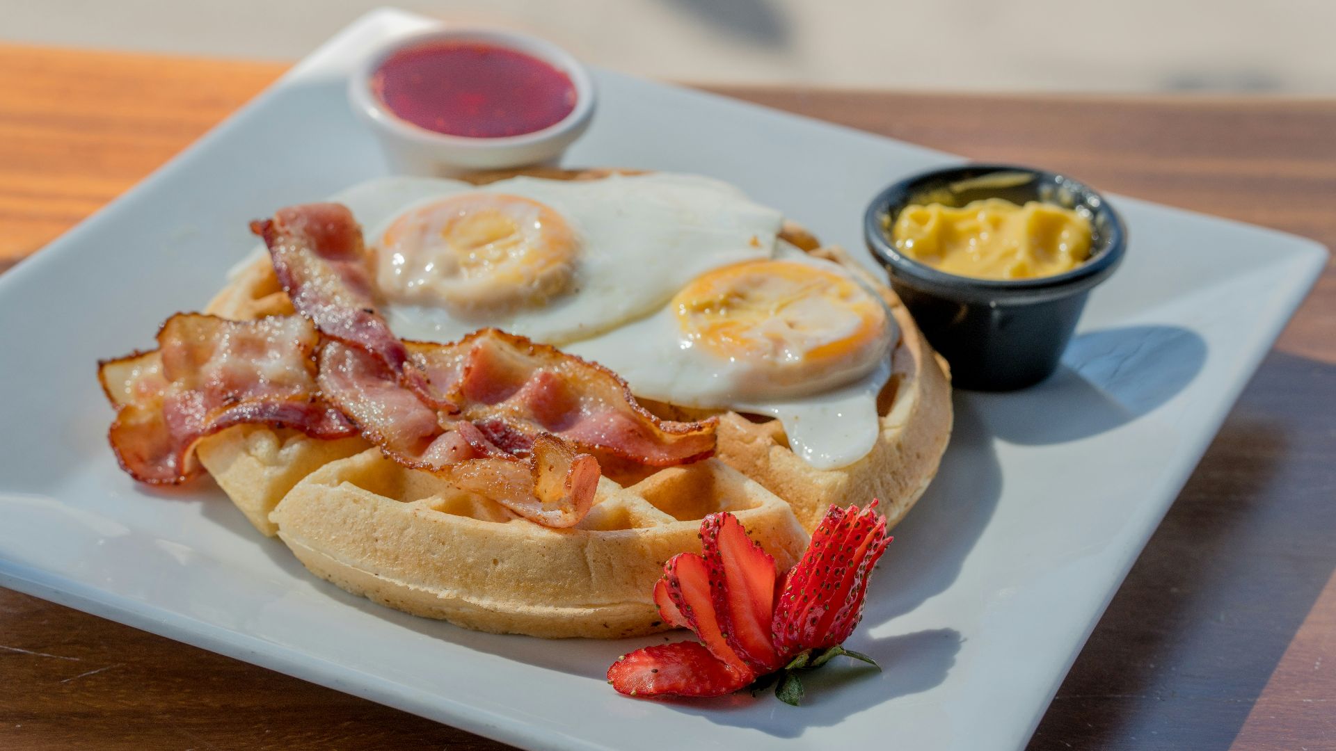 bread with meat and sauce on white ceramic plate