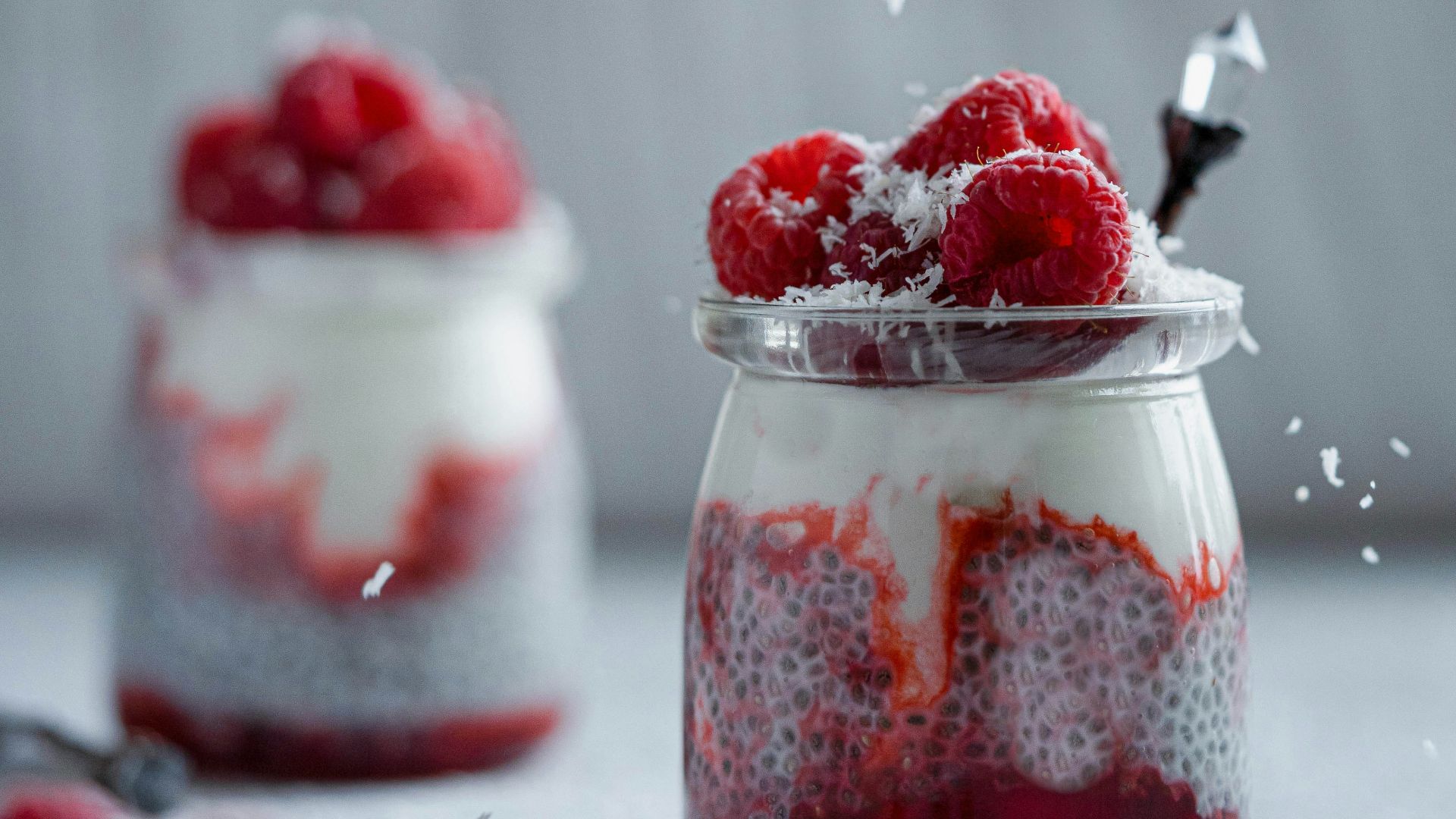 red and white ice cream on clear glass container