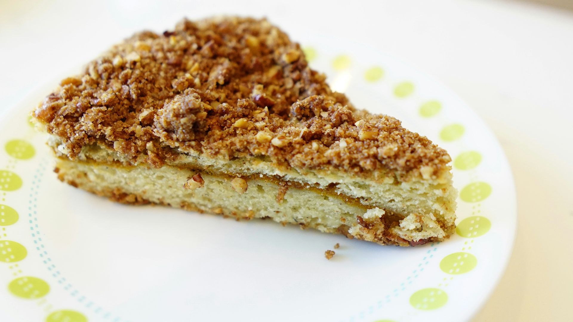 brown bread on white and blue polka dot plate