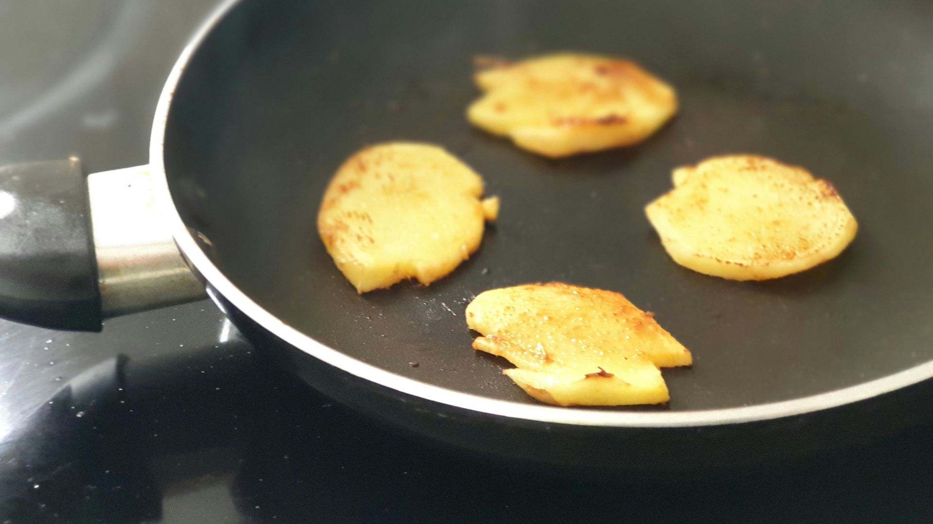 brown cookies on black plate