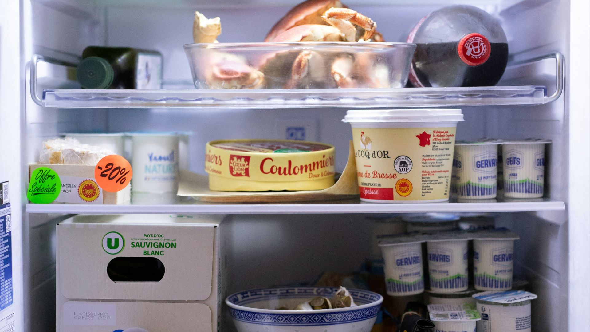 an open refrigerator filled with lots of food