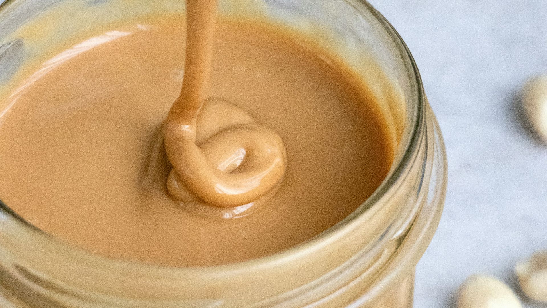 clear glass jar with brown liquid