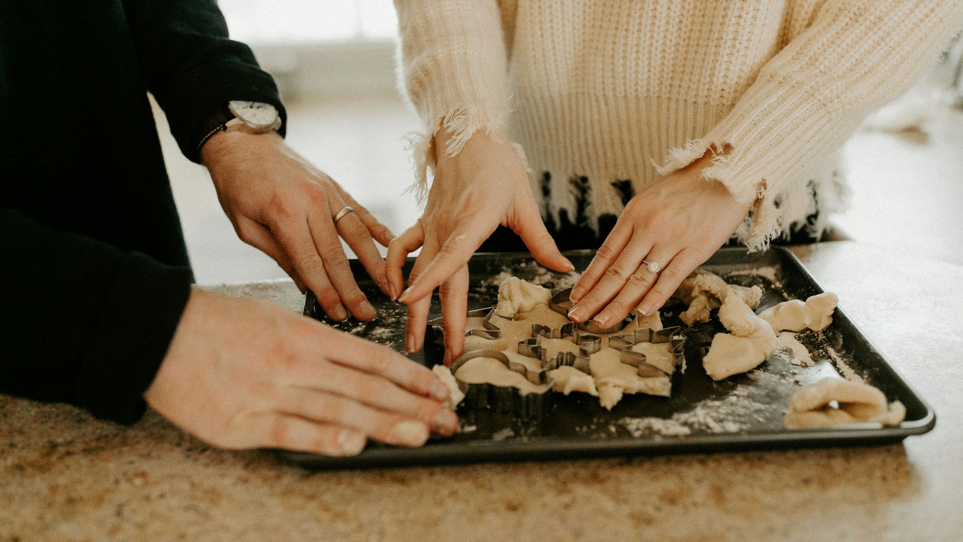 shallow focus photo of person touching black tray