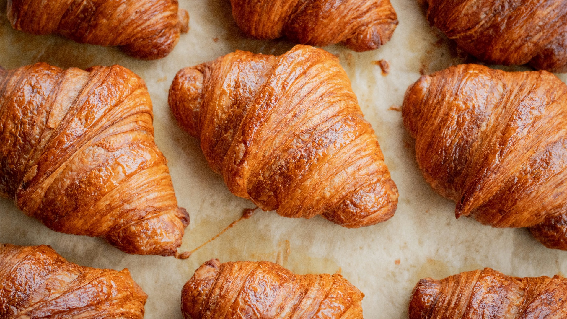 a bunch of croissants that are on a table